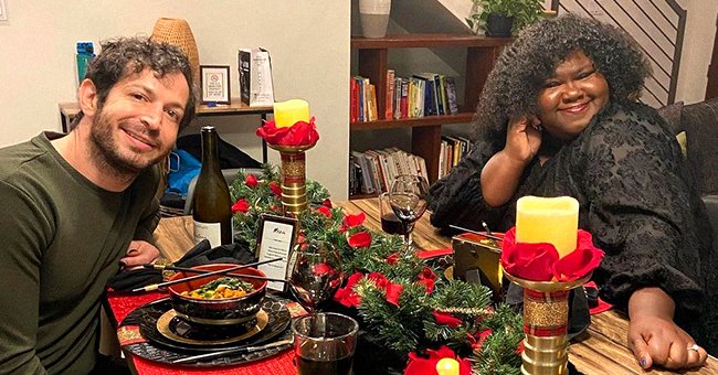 Gabourey Sidibe and her fiancé enjoying a holiday meal : Photo: Instagram.com/brandontour