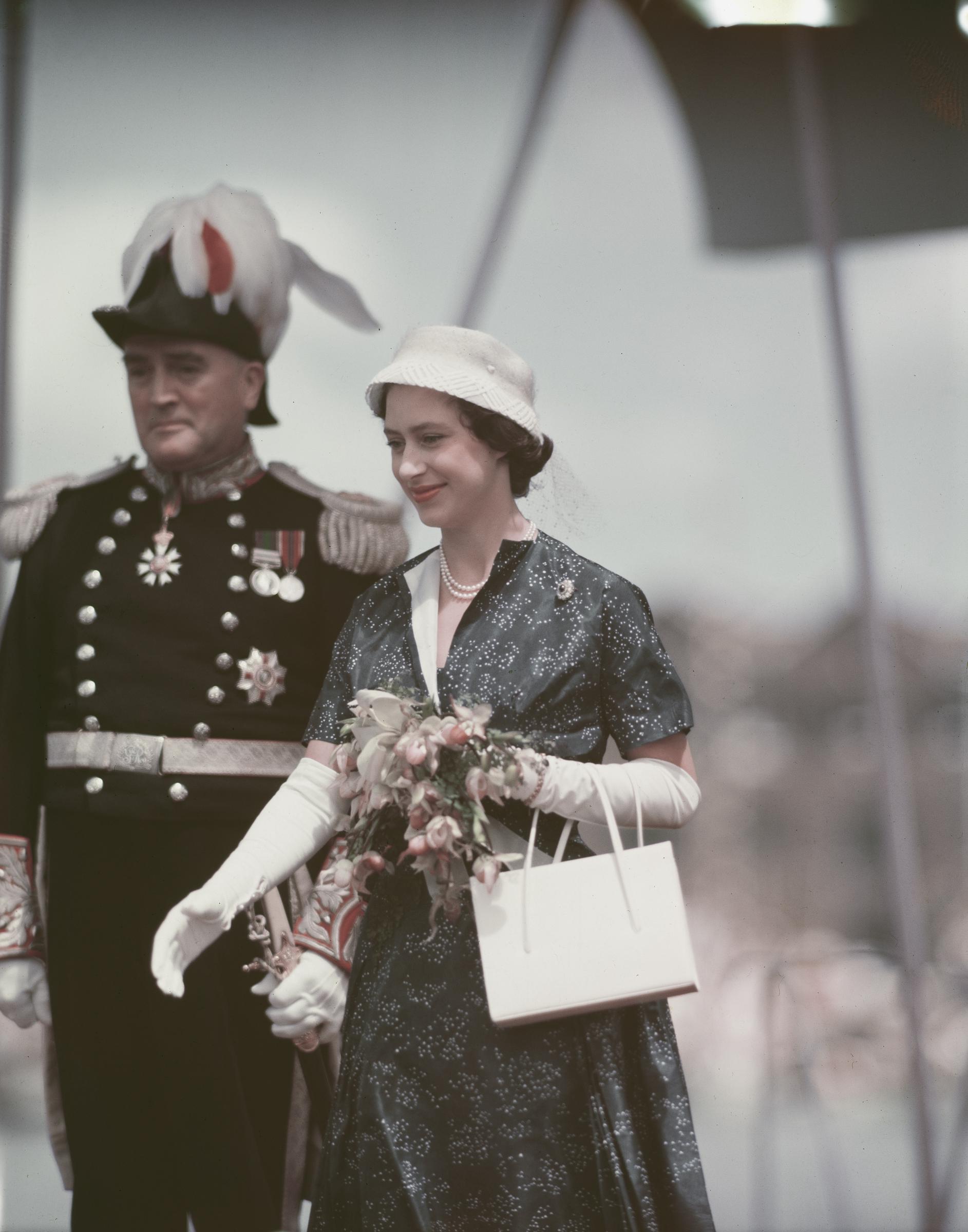 Princess Margaret greeting officials during her East African Tour in Port Louis, Mauritius in 1956. | Source: Getty Images