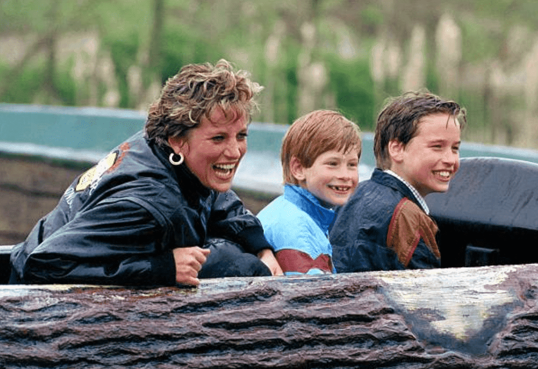 Princess Diana Of Wales and her son's Prince William and Prince Harry enjoy a ride on water slide tree trunk at the "Thorpe Park" Amusement Park, on April 13 1993 | Source: Julian Parker/UK Press via Getty Images