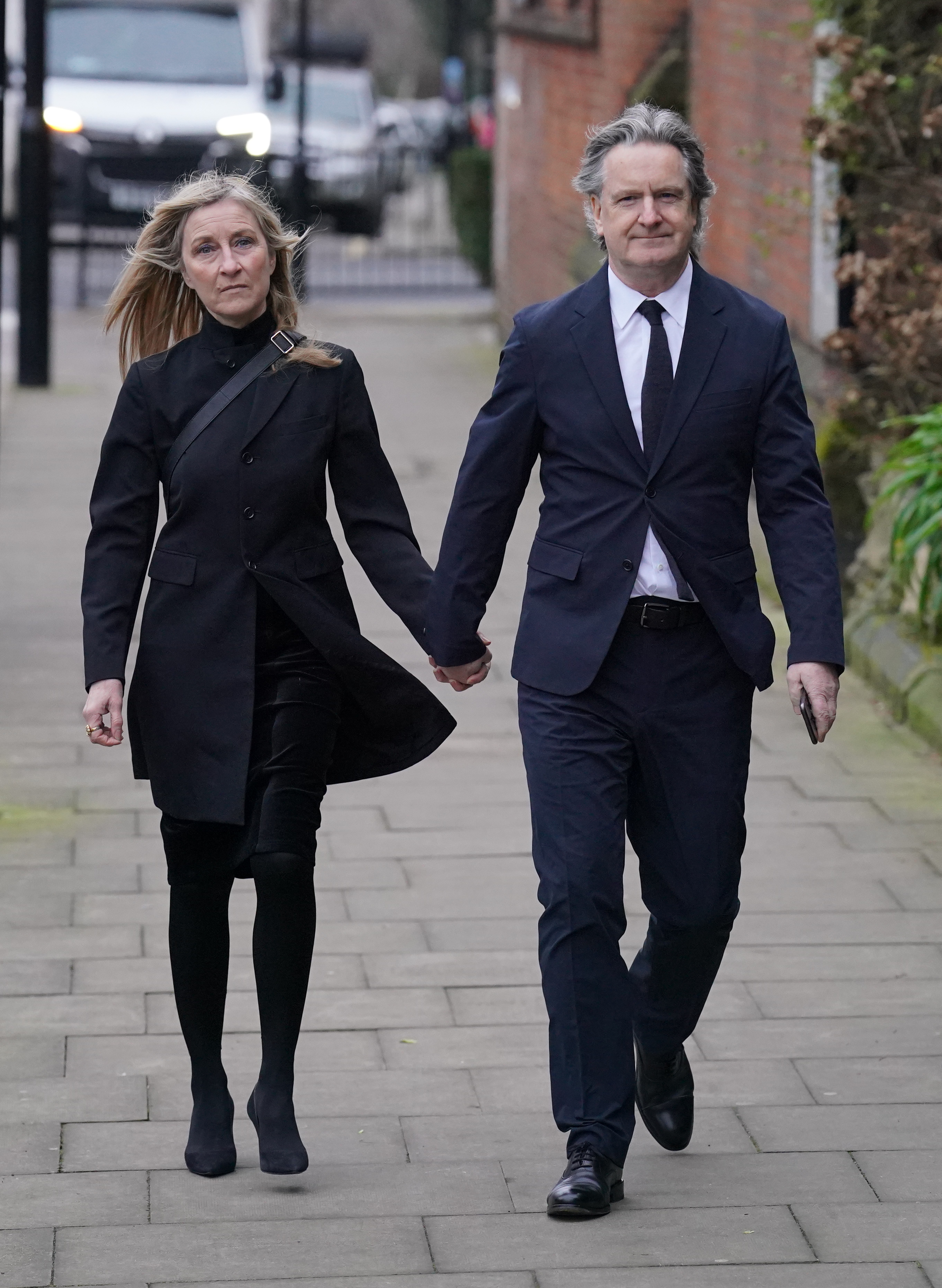 Fiona Phillips and Martin Frizell attend the funeral of Derek Draper at St Mary the Virgin Church on 2 February 2024 in London, England. | Source: Getty Images