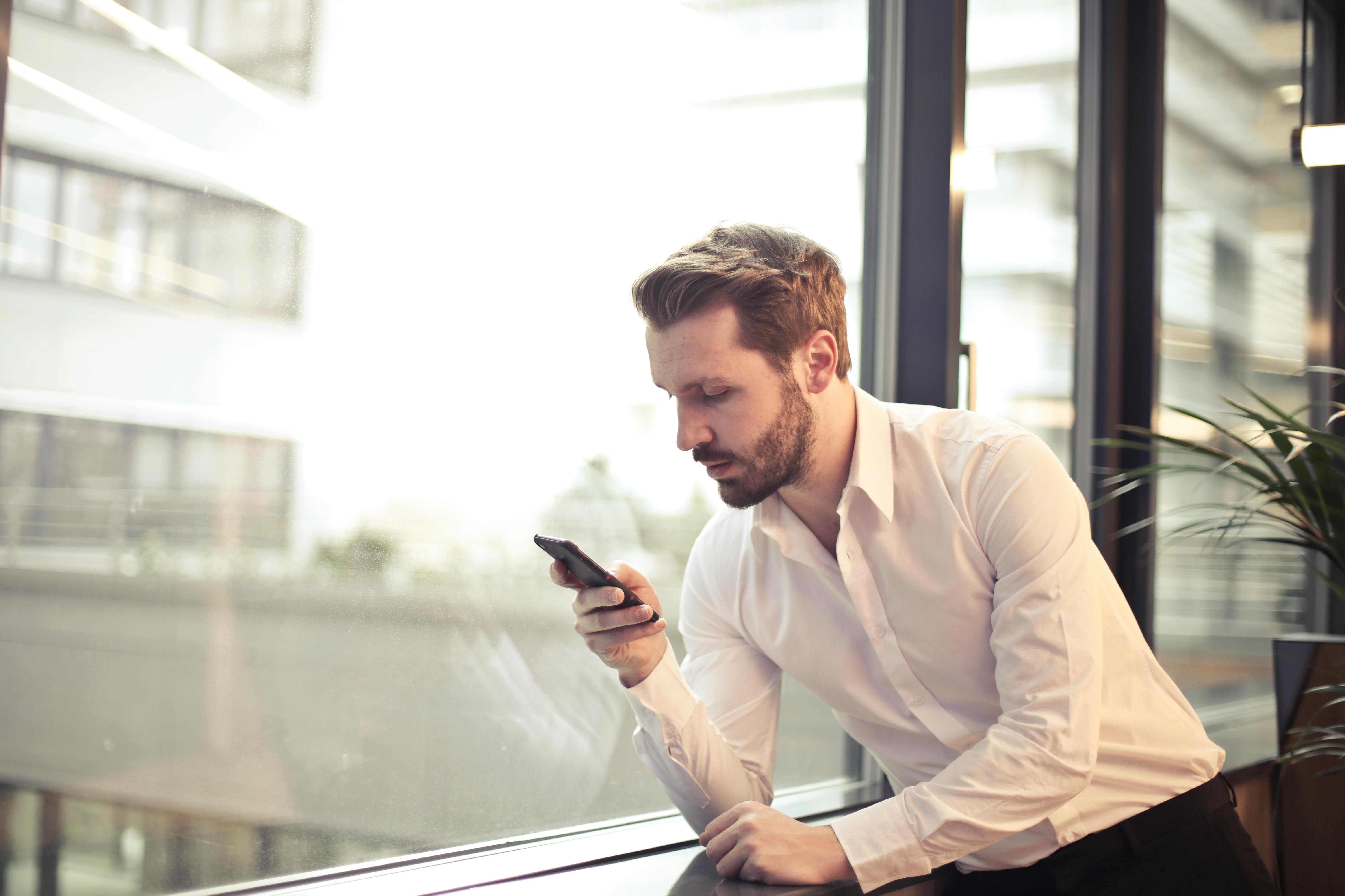 A man looking at his phone | Source: Pexels