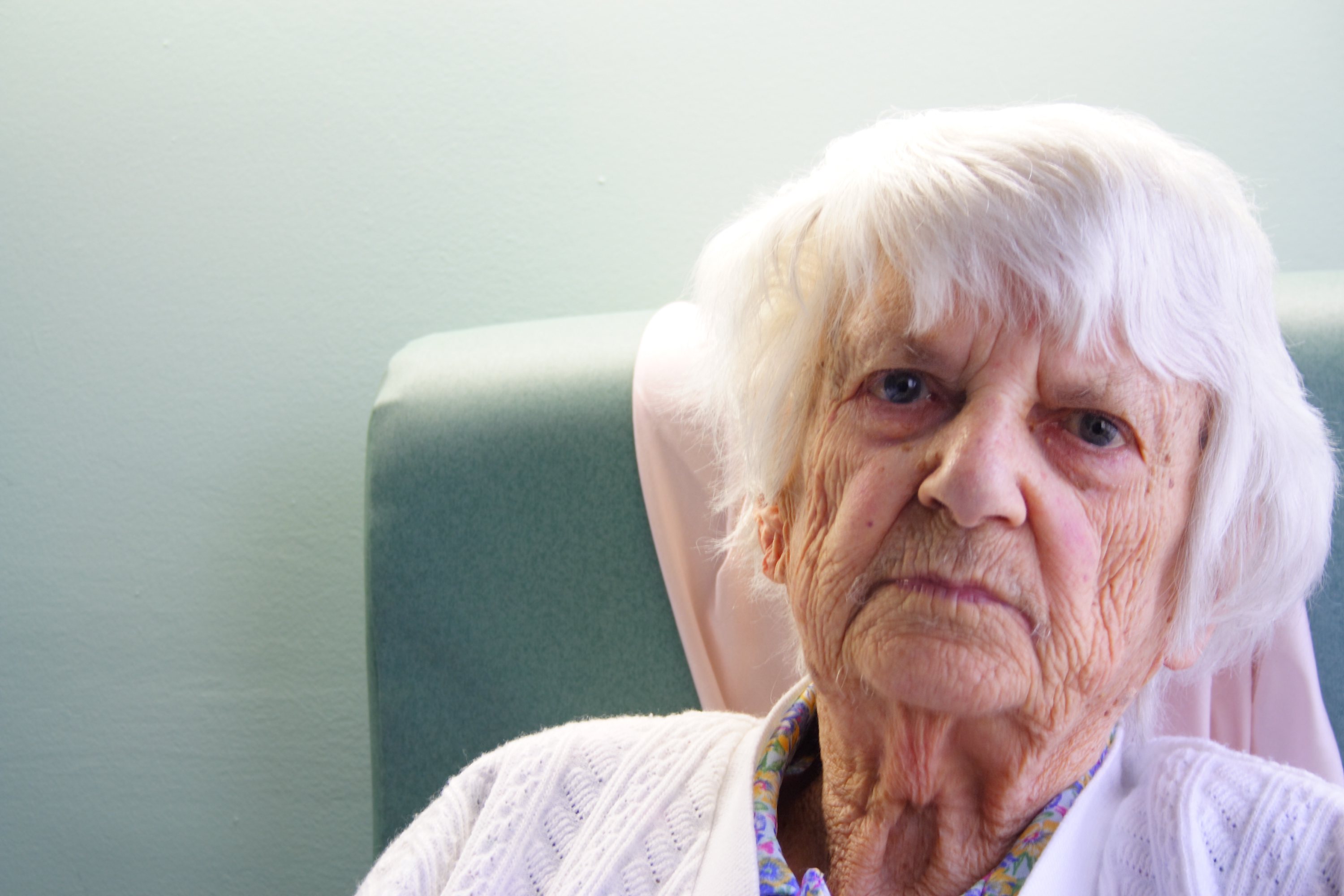 A serious-looking elderly woman | Source: Shutterstock