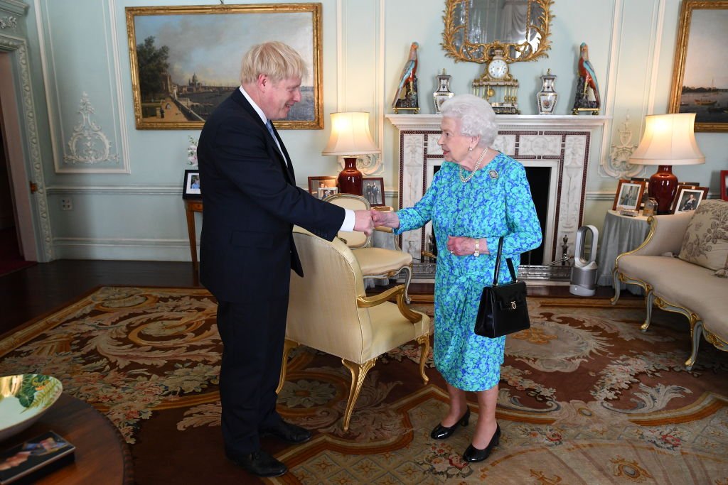 Queen Elizabeth II welcomes newly elected  Boris Johnson in Buckingham Palace on July 24, 2019, in London, England. | Source: Getty Images.