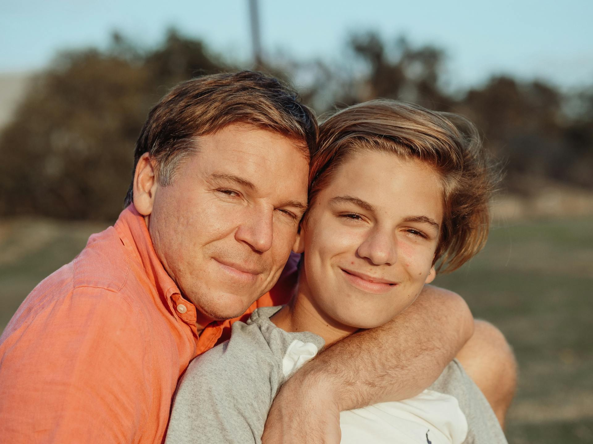A father and son posing together | Source: Pexels