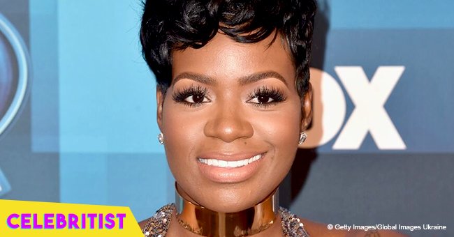 Fantasia stuns in strapless black dress on 34th birthday in photo with husband