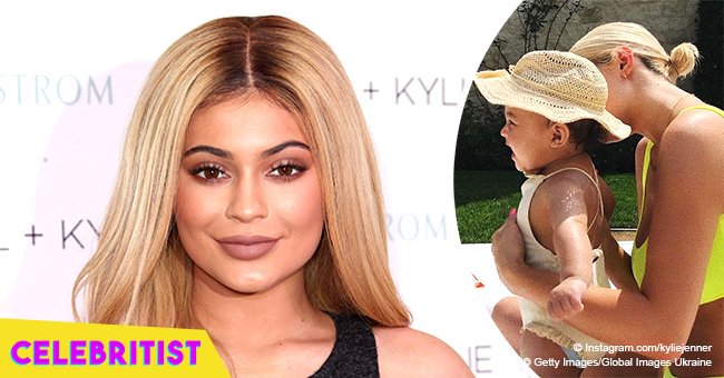 Kylie Jenner shares photo of daughter Stormi in baby swimsuit and straw hat