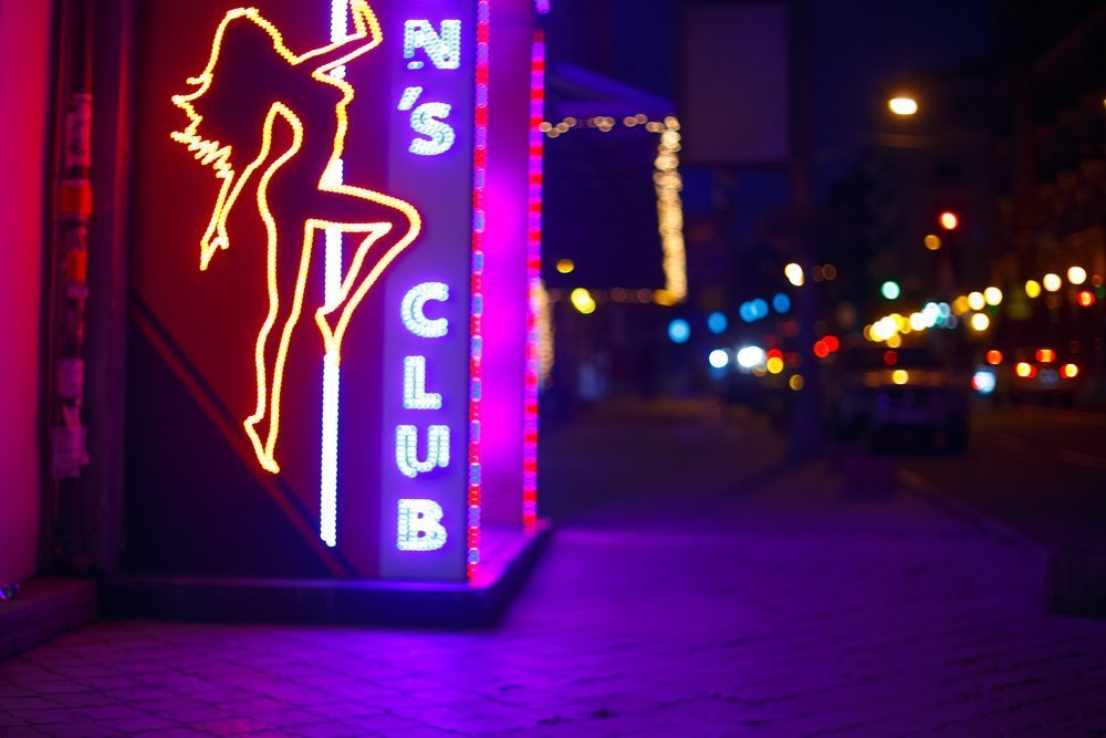 Neon Signs of A Men's Club :Photo: Shutterstock