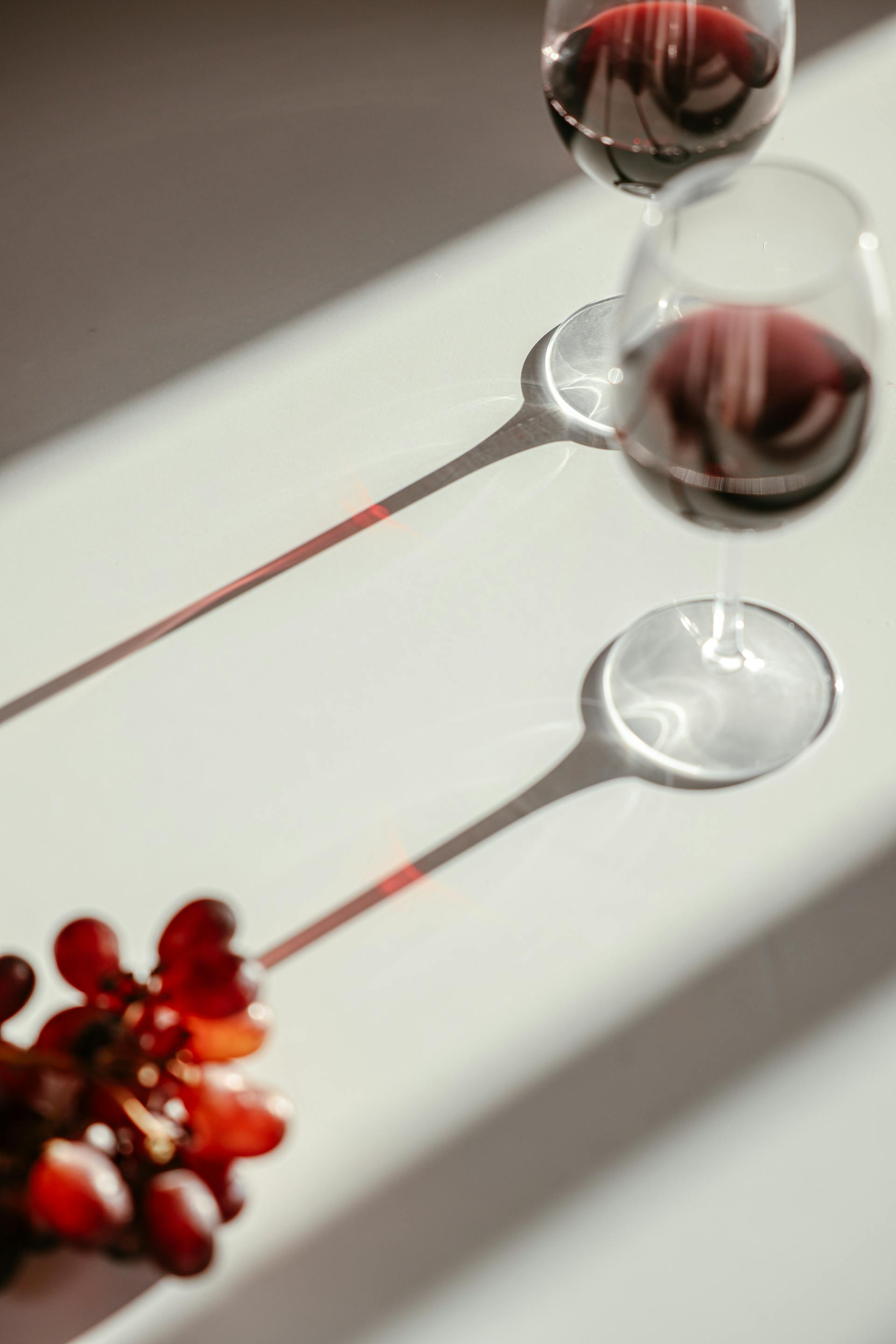 Wine glasses on a table | Source: Pexels