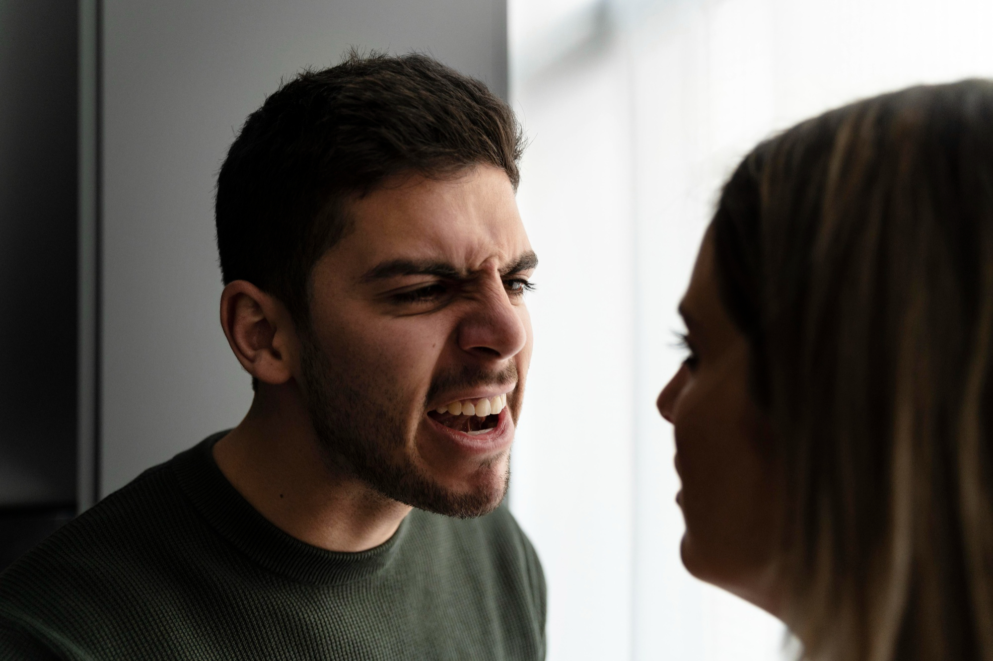 A man berating a woman | Source: Pexels