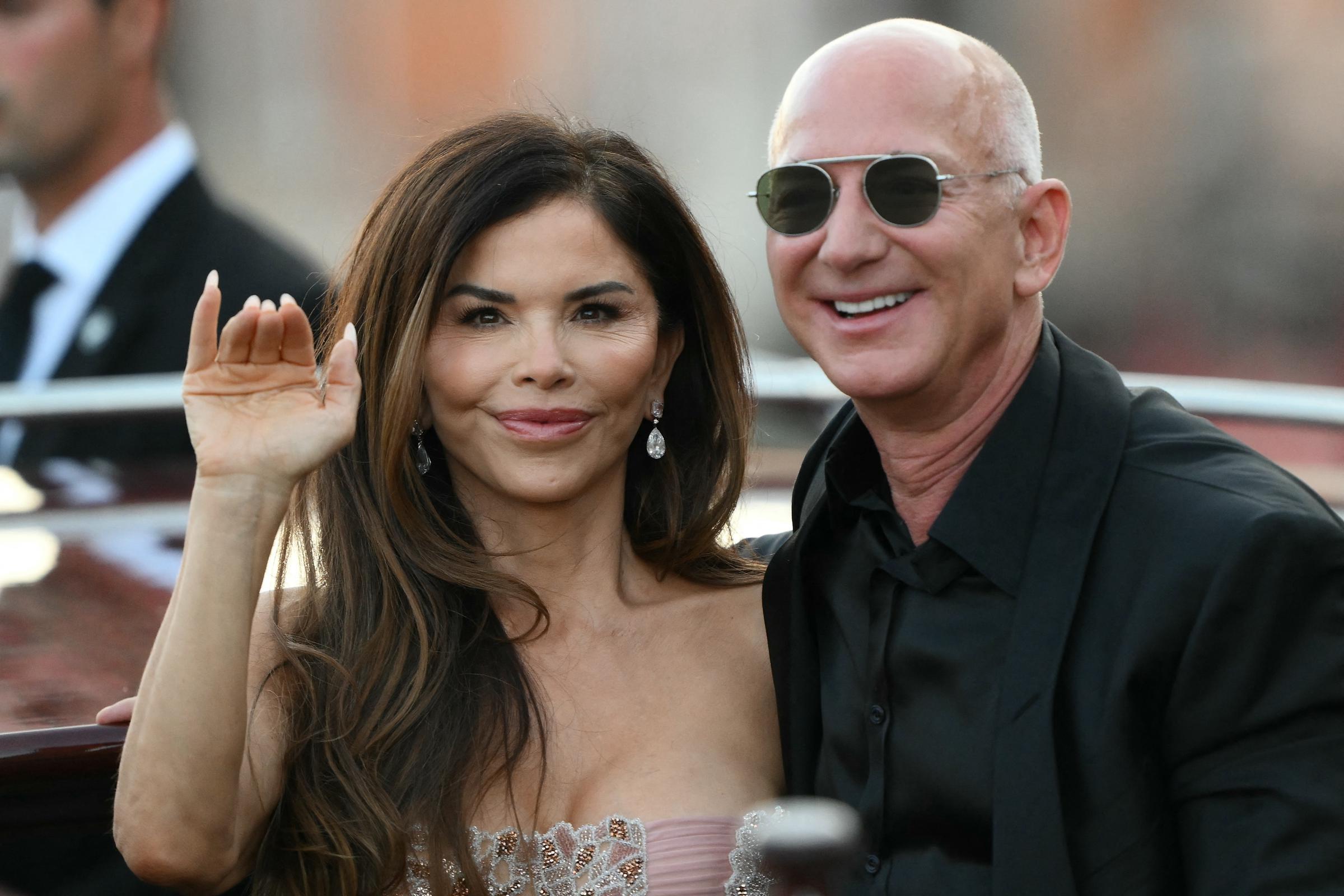 Lauren Sánchez and Jeff Bezos leave the Aman Hotel during their wedding celebrations in Venice, Italy, on June 28, 2025 | Source: Getty Images
