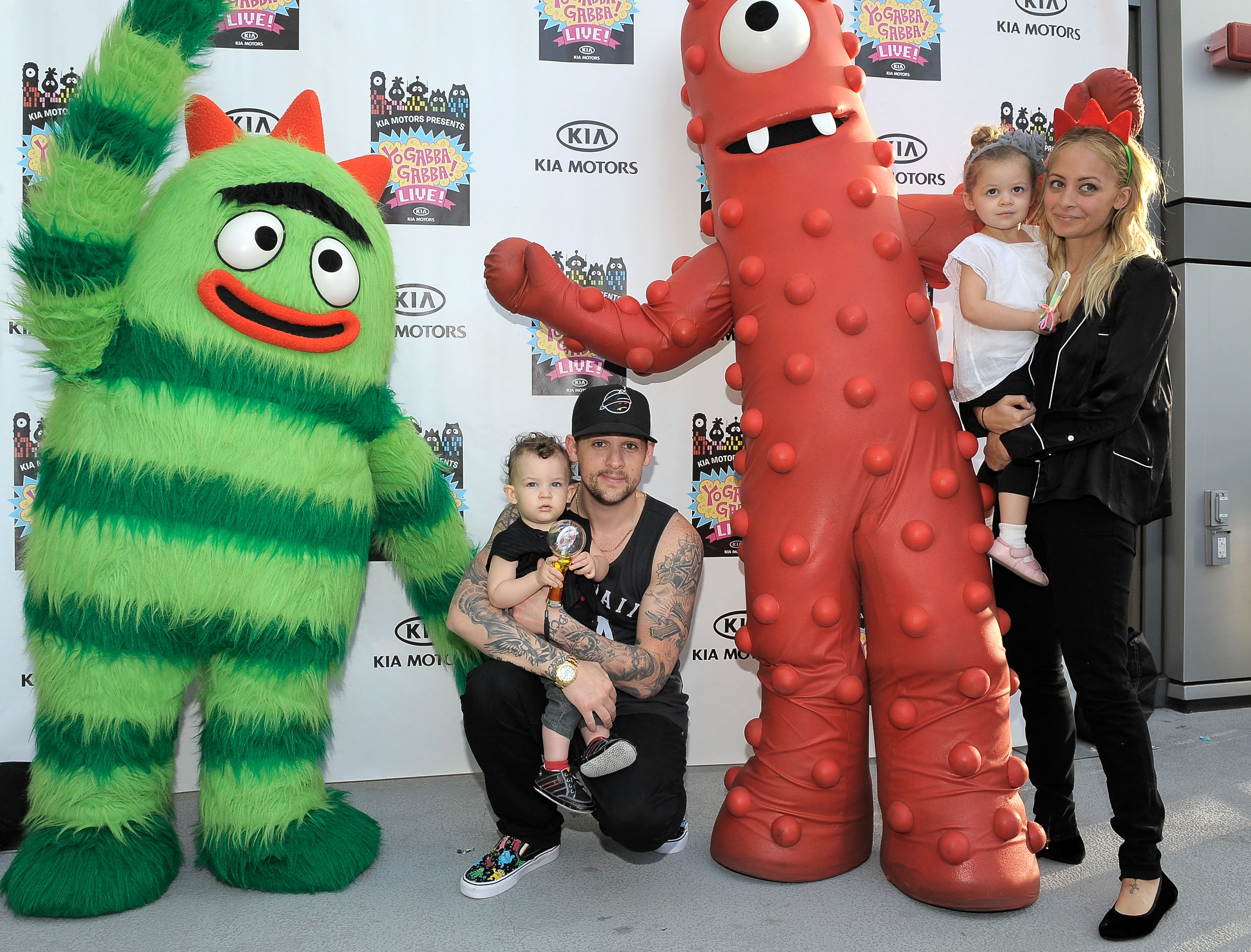 Sparrow Madden, Joel Maddem, Harlow Madden and Nicole Richie posing with "Yo Gabba Gabba!" characters at the "Yo Gabba Gabba!" Live! There's A Party In My City! event in Los Angeles, California on November 27, 2010 | Source: Getty Images