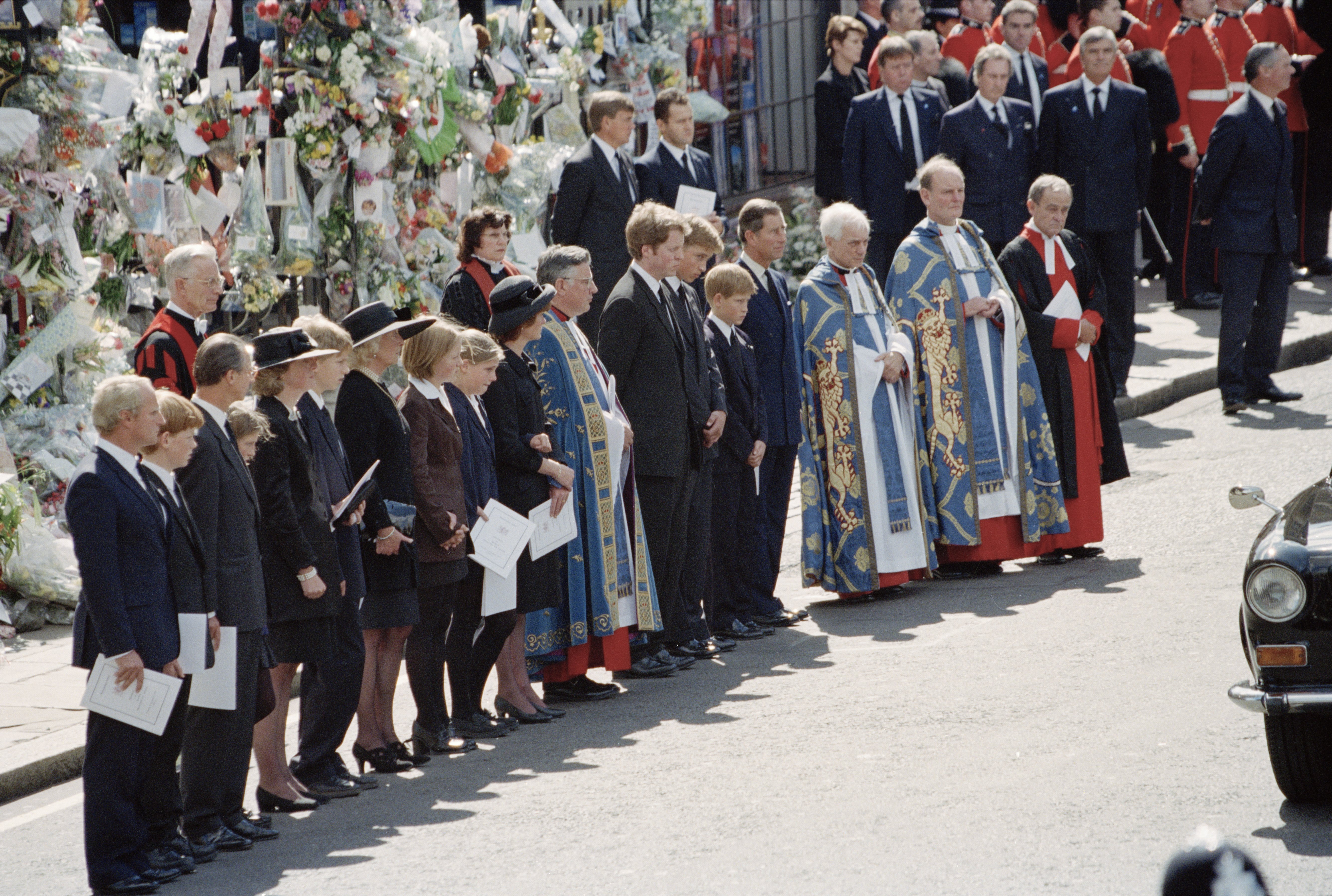 The funeral of Diana, Princess of Wales at Westminster Abbey in London,  September 6, 1997. The line-up of family members as the coffin leaves the Abbey after the ceremony. | Source: Getty Images
