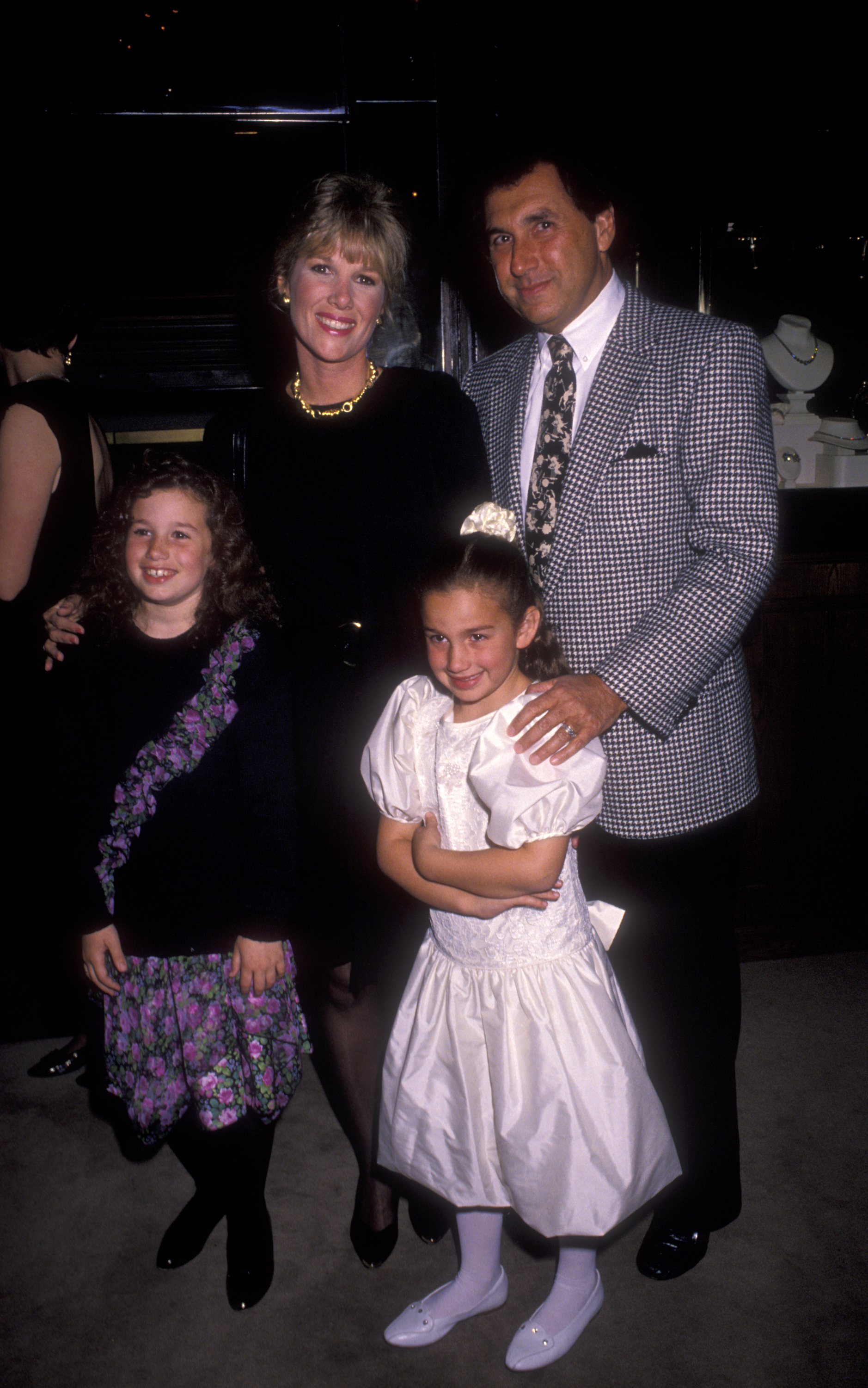 Joan Lunden, Michael Krauss and daughters Lindsay and Jamie attend Champagne At Chartier Dinner Gala at the Cartier Building in New York City on October 29, 1990. | Source: Getty Images