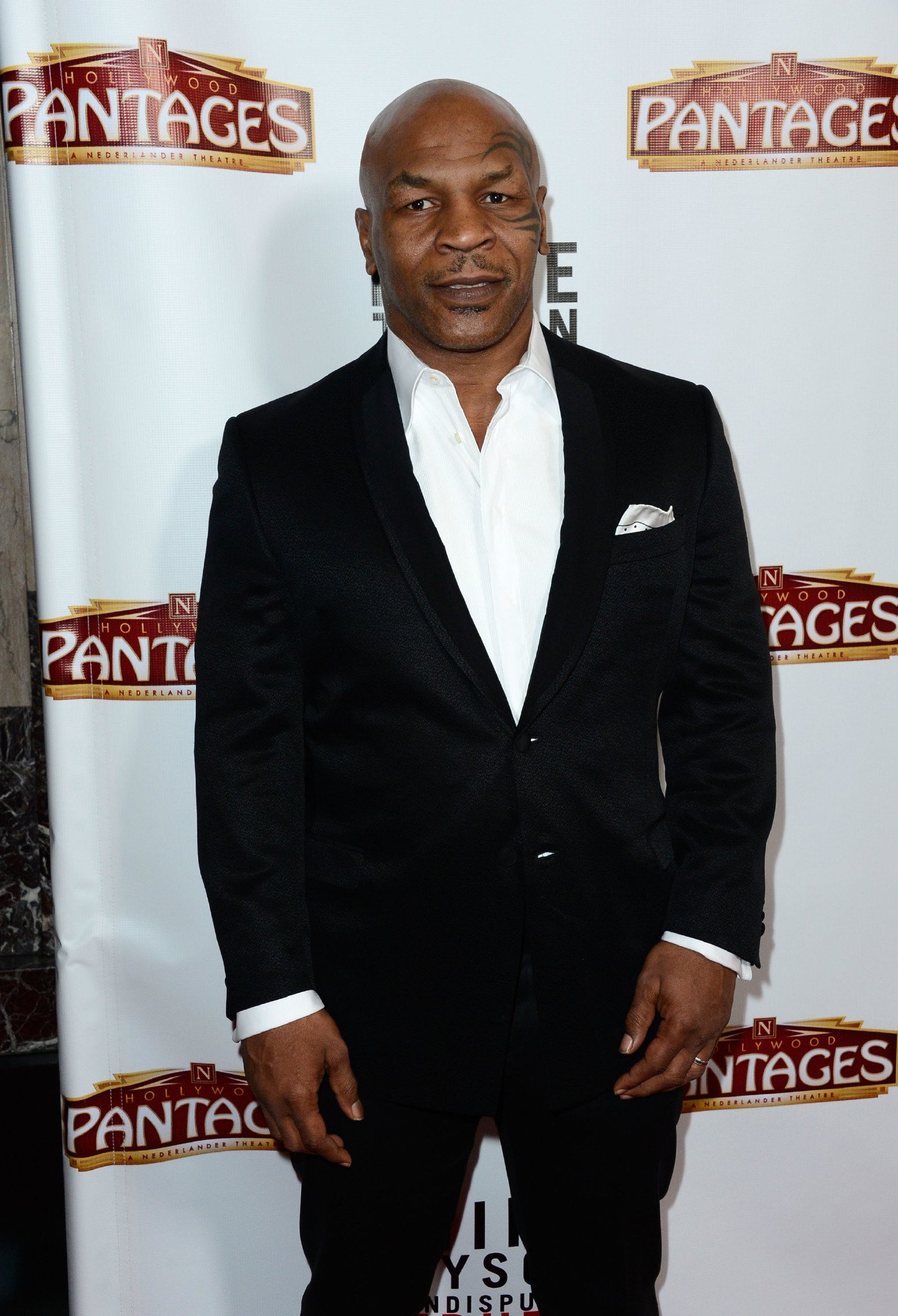 Mike Tyson arrives at the opening Night Of "Mike Tyson: Undisputed Truth" At The Pantages Theatre at the Pantages Theatre | Getty Images