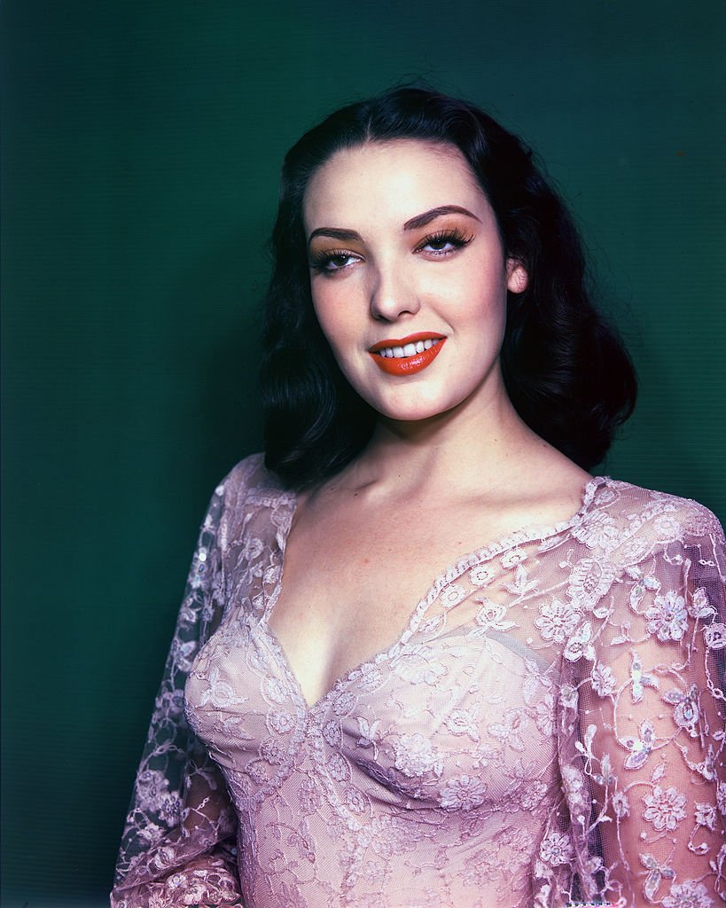 US actress Linda Darnell smiling in a studio portrait circa 1950. | Photo: Getty Images