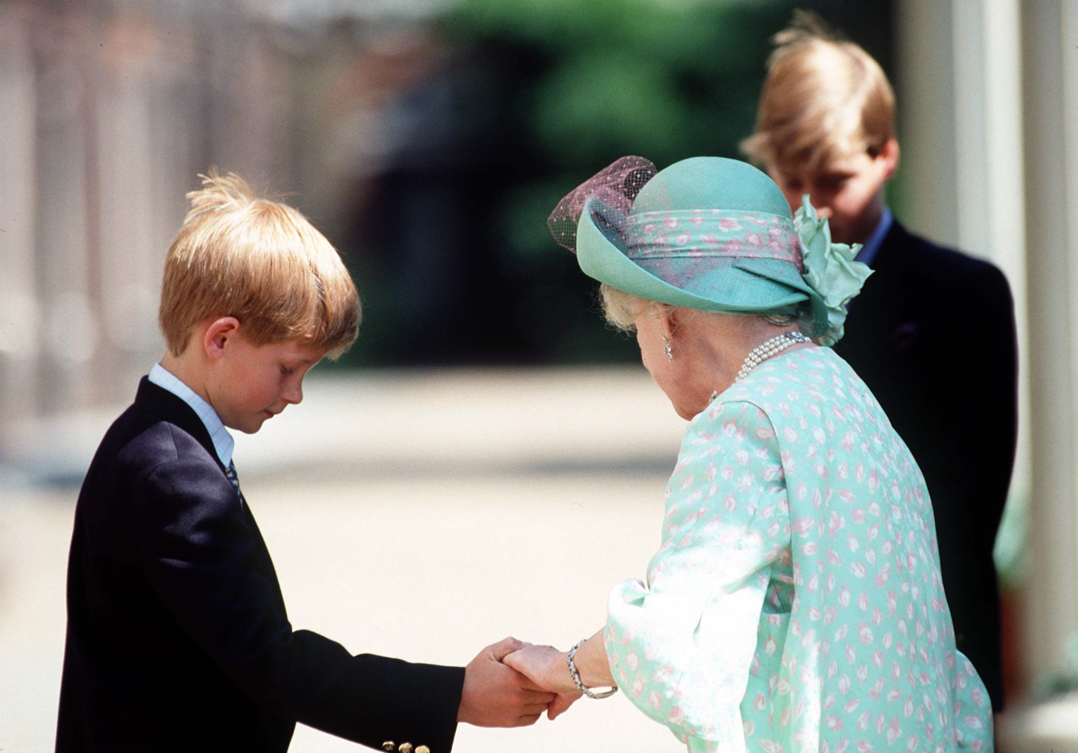 The Queen Mother's 95th Birthday At Her Home Clarence House, London. Prince Harry Holds His Grandmother's Hand in August 1995 | Source: Getty Images