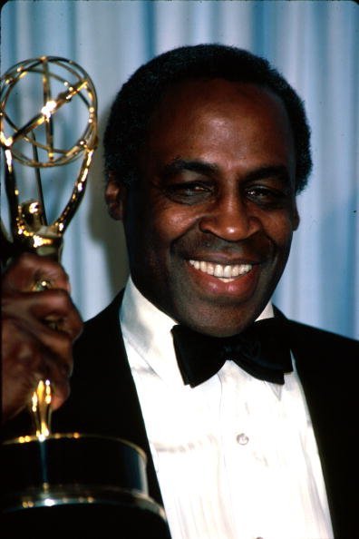 Late actor Robert Guillaume holding up his award in Press Room at Primetime Emmy Awards | Photo: Getty Images