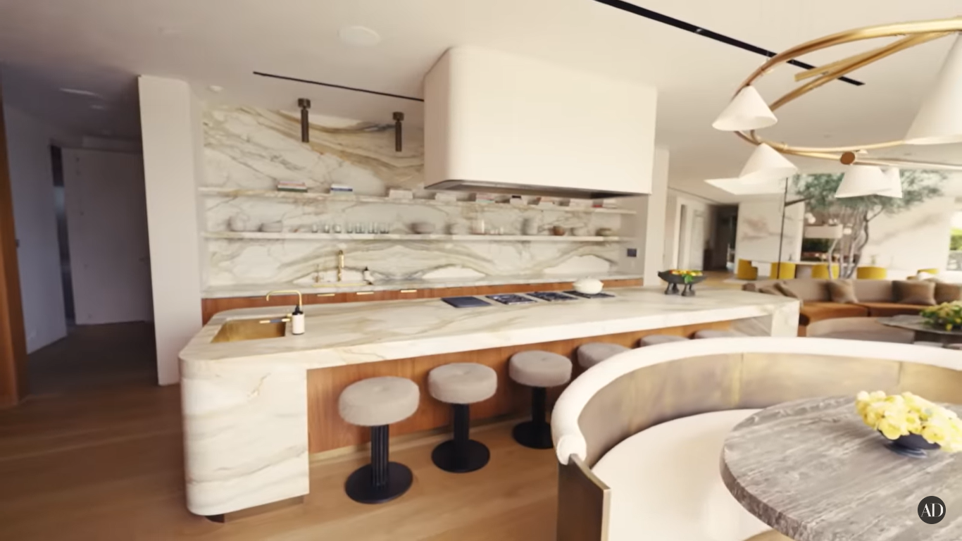 Chrissy Teigen and John Legend's kitchen at their Beverly Hills home | Source: YouTube/ArchitecturalDigest