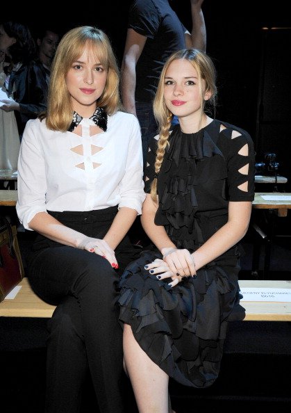 Dakota Johnson and Stella Banderas at la Gaite Lyrique on July 3, 2013 in Paris, France. | Photo: Getty Images