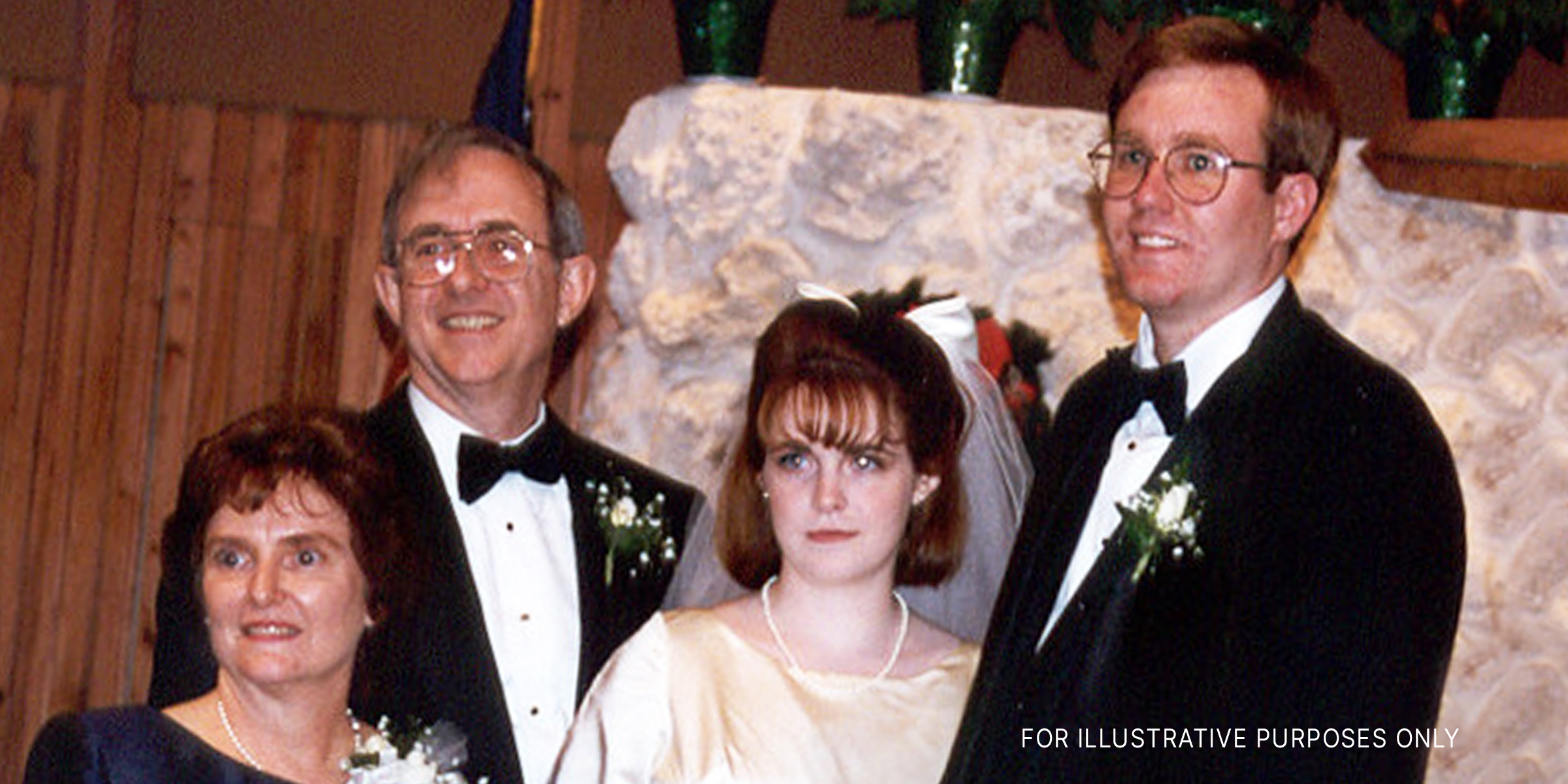 A bride and groom with an older couple | Source: flickr.com/wjarrettc/CC BY 2.0