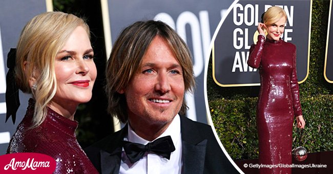 Nicole Kidman turns heads in a sequined maroon dress alongside her husband on the red carpet
