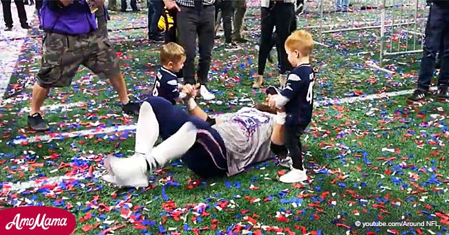 Super Bowl winner forgoes interviews only to roll around on the field with his little sons