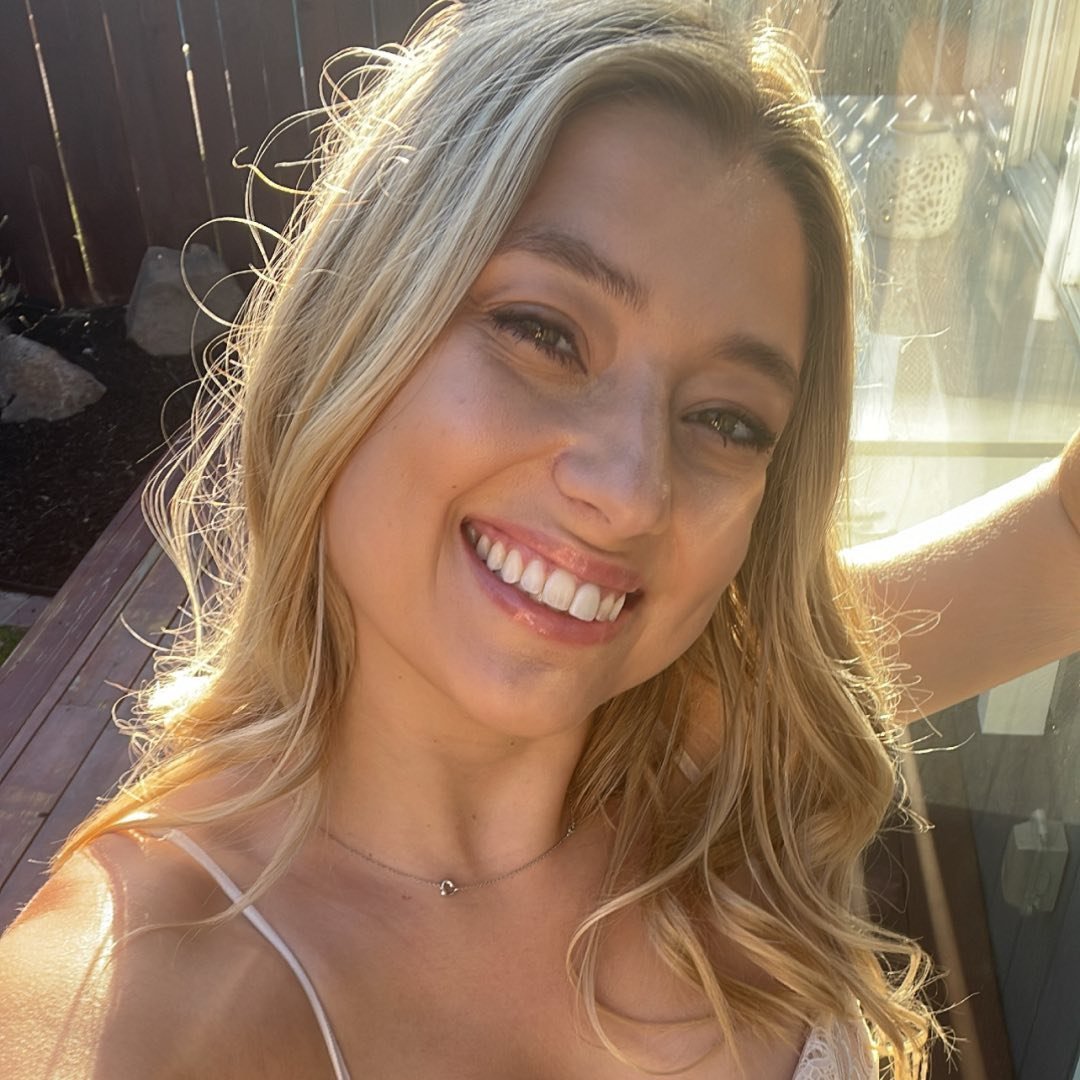 Taylor Triplett smiling for a photo, posted on August 27, 2023. | Source: Facebook/Taylor Triplett