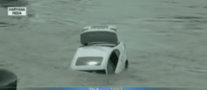The BMW 3 series that was allegedly pushed into the river because it wasn't a Jaguar | Photo: YouTube/CBS This Morning 