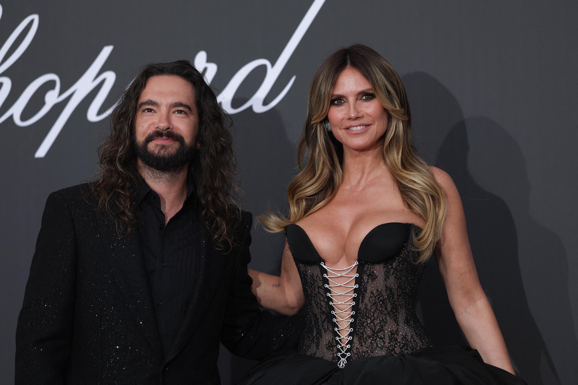 Heidi Klum poses alongside husband Tom Kaulitz, whose unexpected perspective on her changing body challenged the pressures she had faced throughout her modeling career. | Source: Getty Images