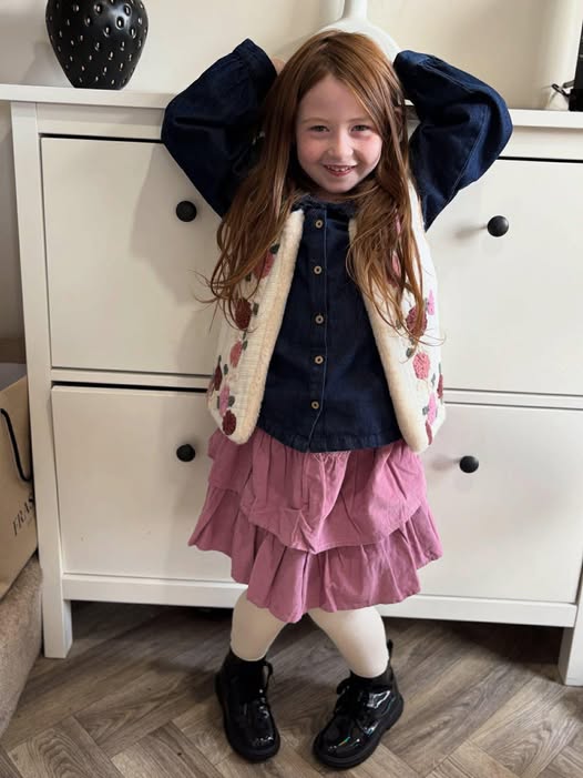 Nyla May Bradshaw posing in her room in a post shared on April 1, 2026 | Source: Facebook/Little Rainbows Doncaster Children's Autism Charity