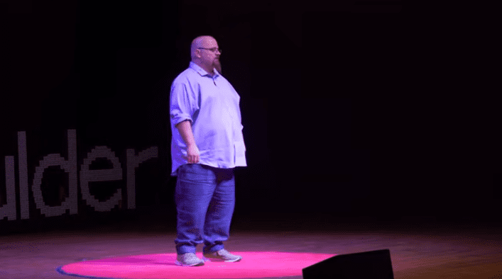 Aaron Stark gave a speech on stage on Jun 26, 2018 | Photo: Youtube/TEDx Talks