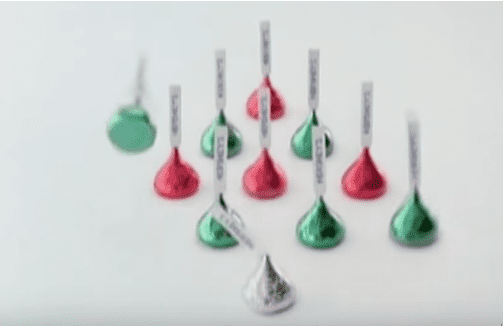 A still from the original Hershey's Kisses Christmas Bell commercial which first aired in 1989. | Photo: YouTube/Ms Mojo