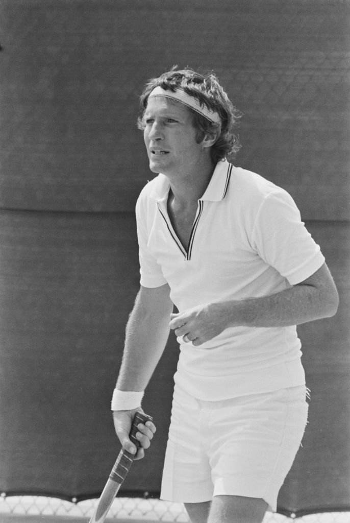 American actor Ron Ely playing in the annual celebrity tennis tournament, held at the La Costa Resort & Spa in Carlsbad, California, 26th June 1971. | Photo: Getty Images