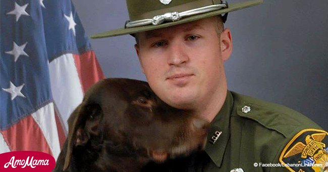 K9 officer 'kissed' his human partner in official portrait