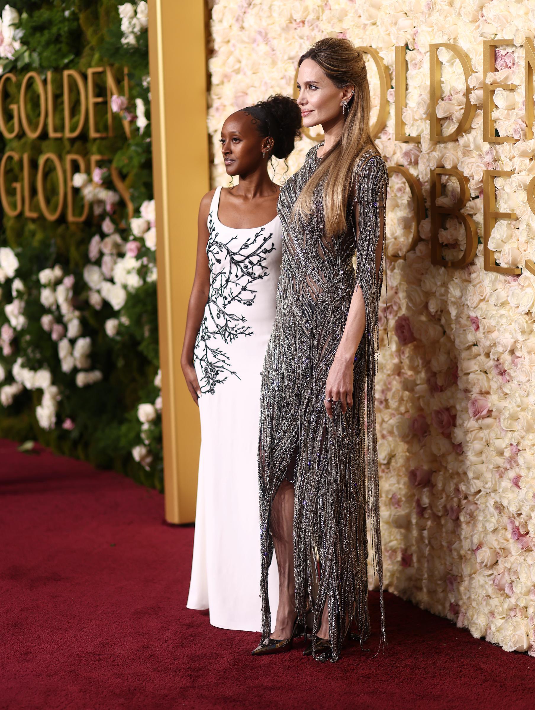 Zahara Marley and her mother, Angelina Jolie at the 82nd annual Golden Globe Awards at the Beverly Hilton hotel in Beverly Hills, California, on January 5, 2025 | Source: Getty Images