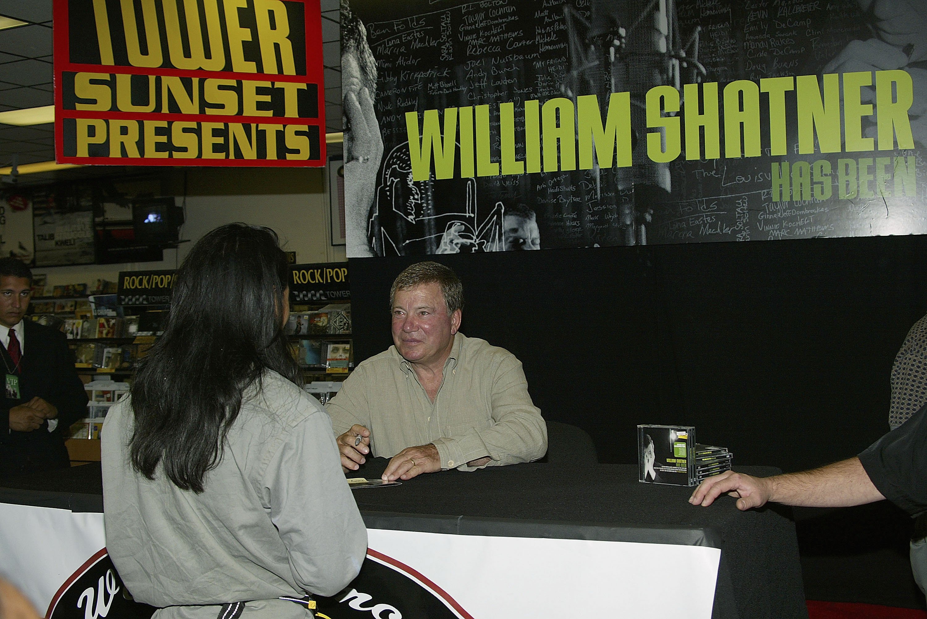 Actor William Shatner signs a copy of his new CD for a fan during his appearance at Tower Records for his new album "Has Been" on October 5, 2004, in West Hollywood, California. | Source: Getty Images