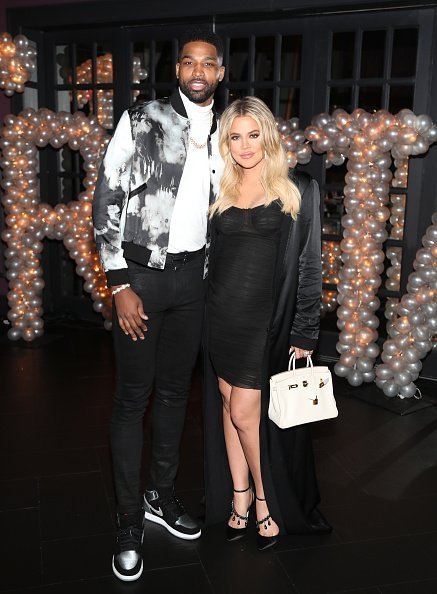 Tristan Thompson and Khloe Kardashian pose for a photo as Remy Martin celebrates Tristan Thompson's Birthday at Beauty & Essex on March 10, 2018 in Los Angeles, California | Photo: Getty Images