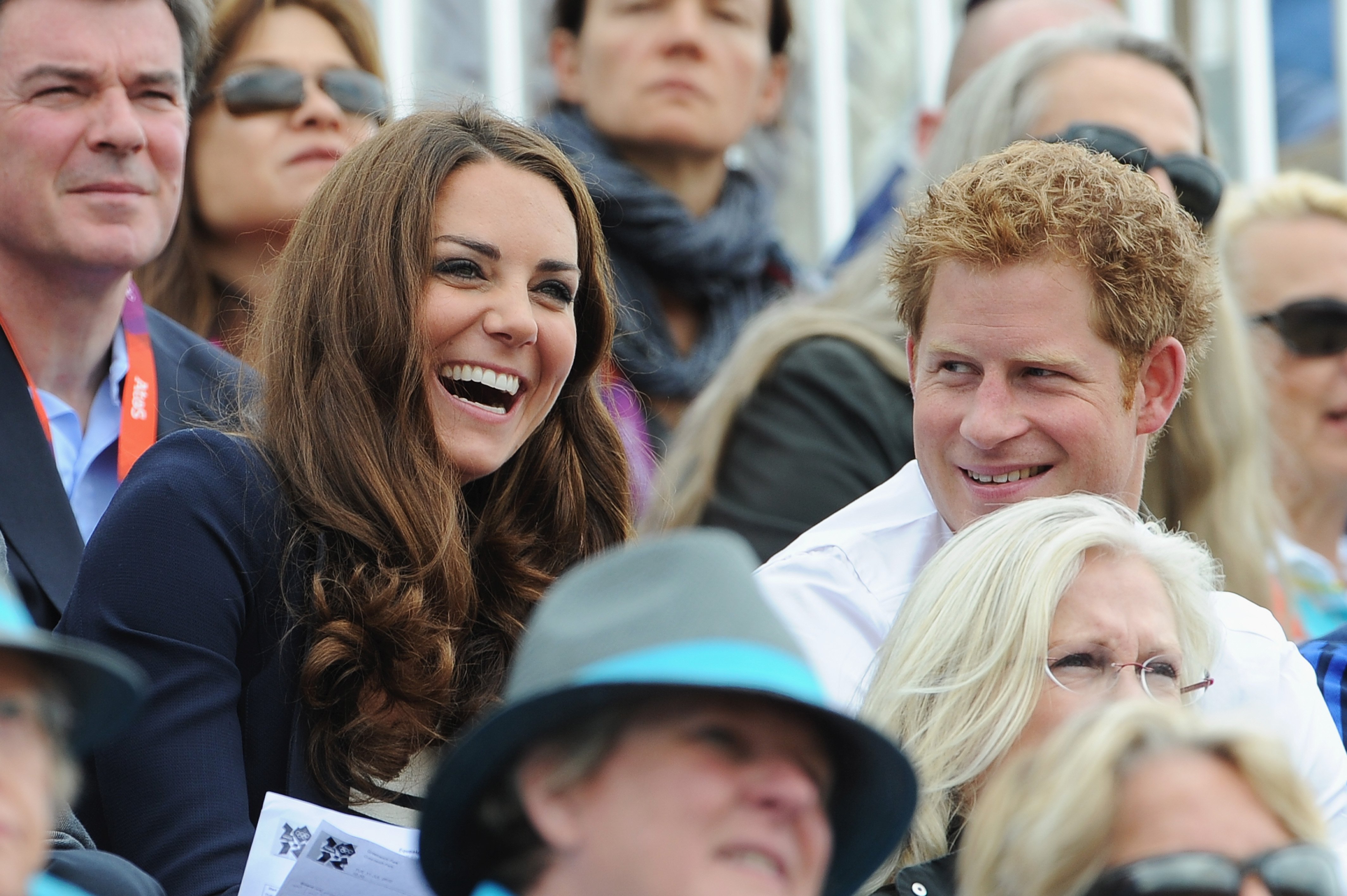 Kate Middleton, Duchess of Cambridge and Prince Harry, Duke of Sussex during the Show Jumping Eventing Equestrian on Day 4 of the London 2012 Olympic Games at Greenwich Park on July 31, 2012 in London, England. | Source: Getty Images