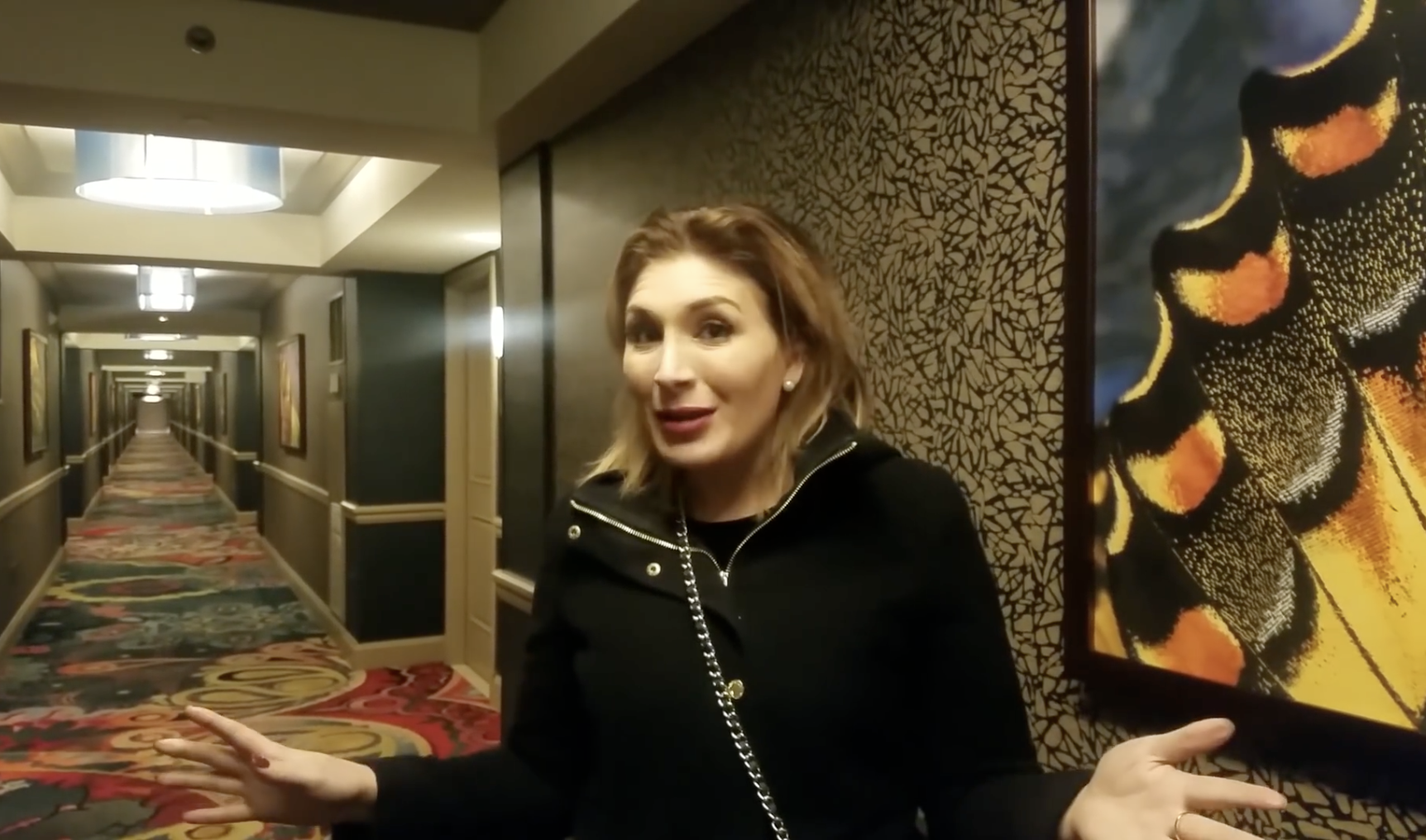 Laura Loomer speaks while filming in a hotel hallway during a vlog-style recording, as posted in January 2918 | Source: Youtube/LauraLoomered