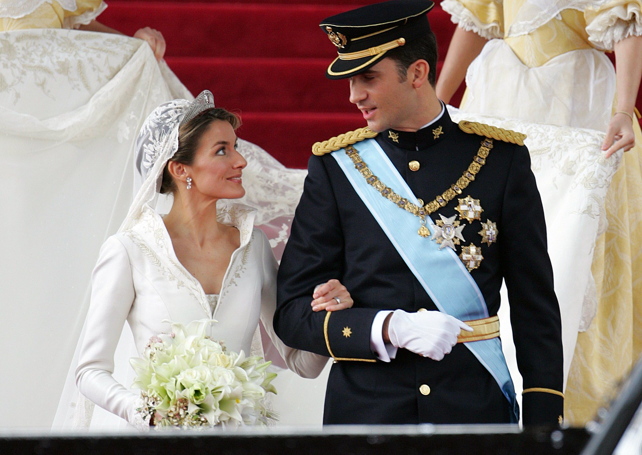 Princess of Asturias Letizia Ortiz and her husband Spanish Crown Prince Felipe of Bourbon pictured leaving Madrid's Almudena Cathedral at the end of their wedding ceremony on May 22, 2004. / Source: Getty Images