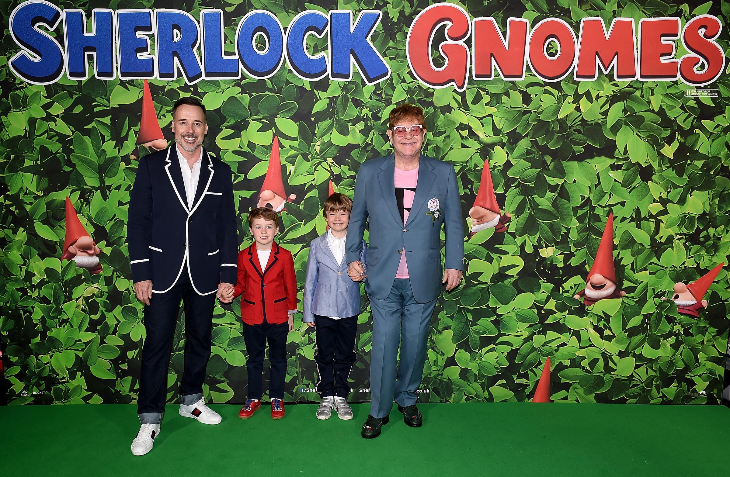 David Furnish and Elton John with their sons Zachary Jackson and Elijah Joseph Daniel Furnish-John at the "Sherlock Gnomes" London Family Gala in London, England on April 22, 2018. | Source: Getty Images