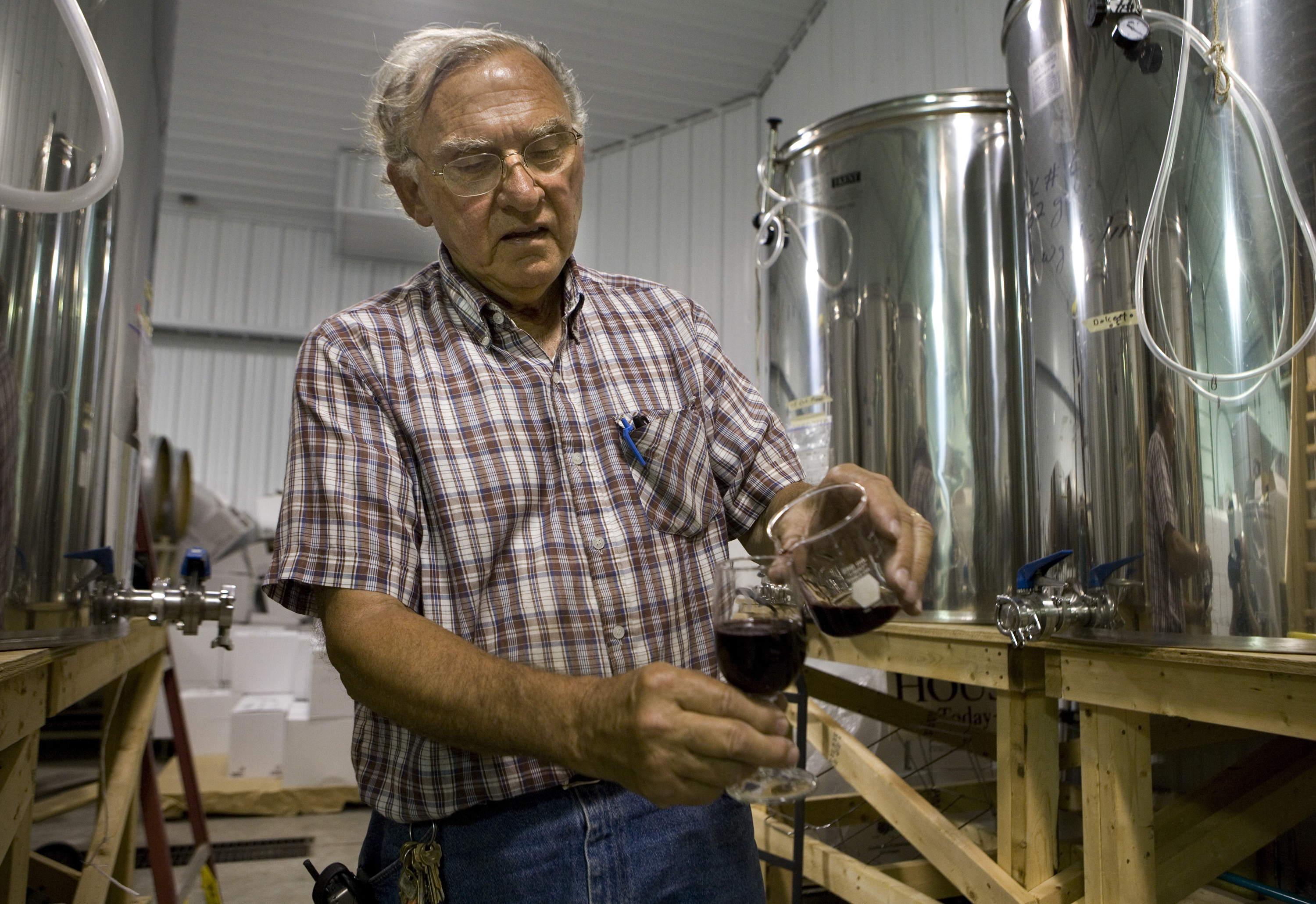 Silvio Ciccone sampling aging wine at Ciccone Vineyard and Winery in Michigan on July 18, 2006. | Source: Getty Images