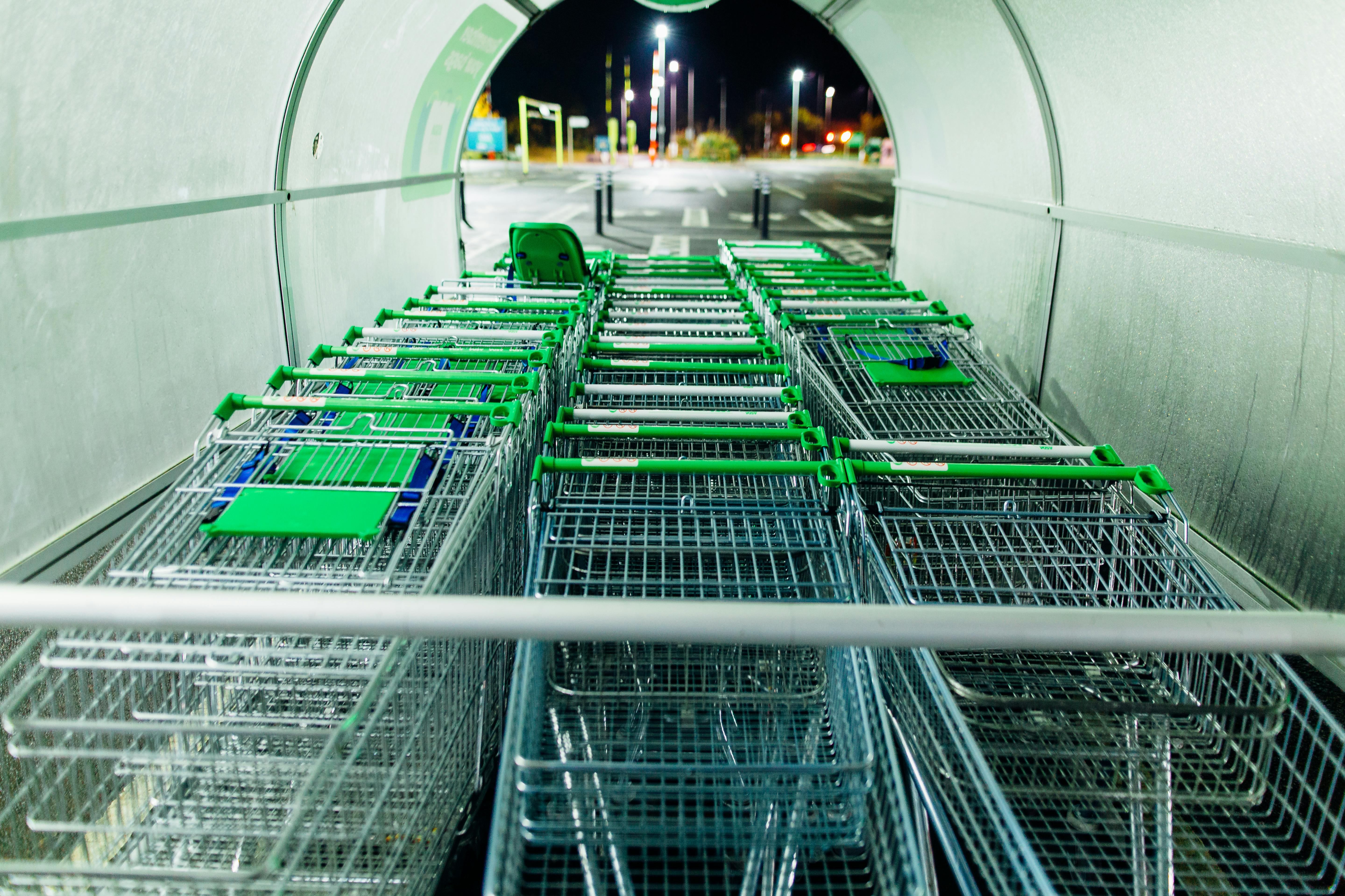 Green shopping carts. | Source: Pexels