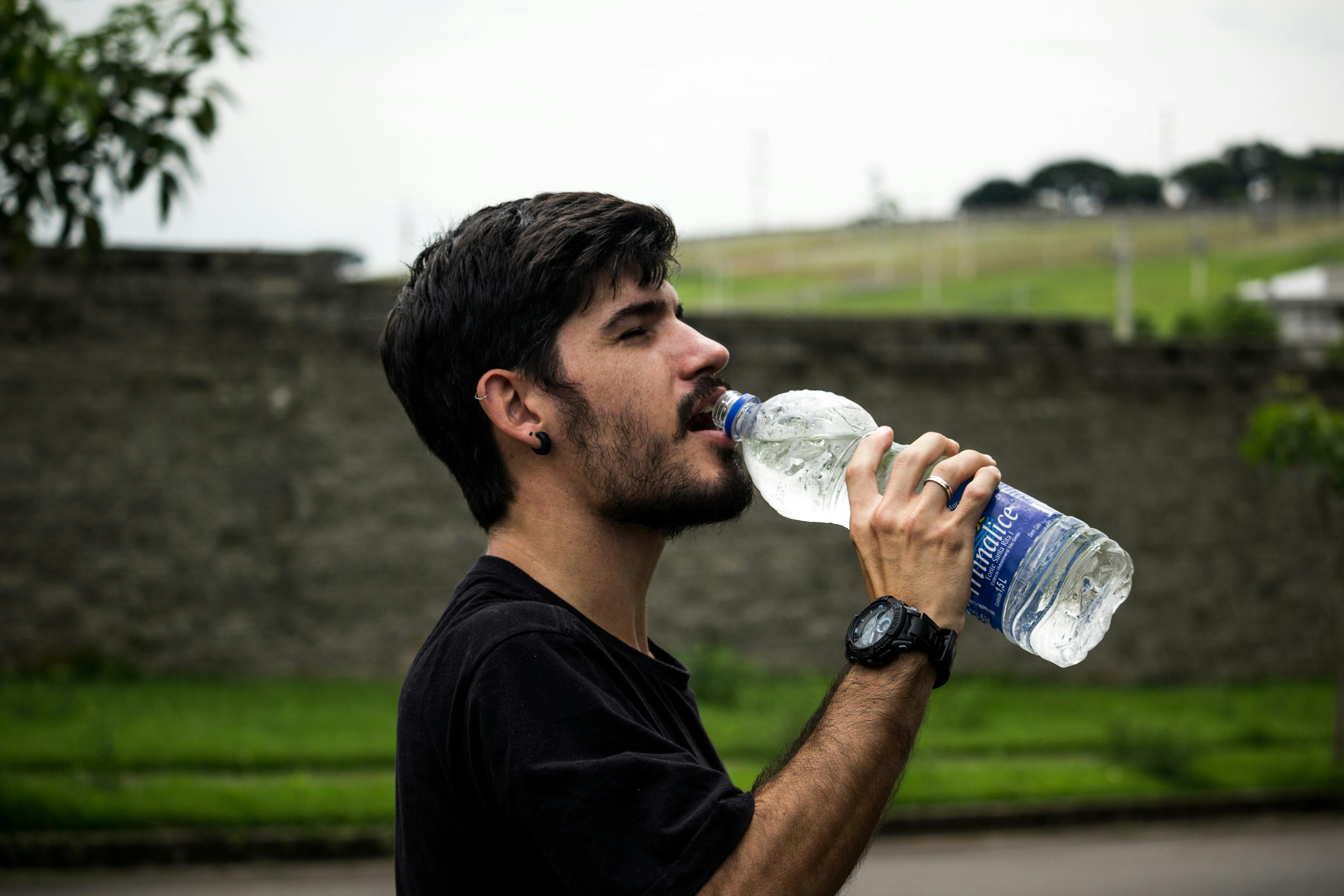 Man drinks water | Source: Pexels