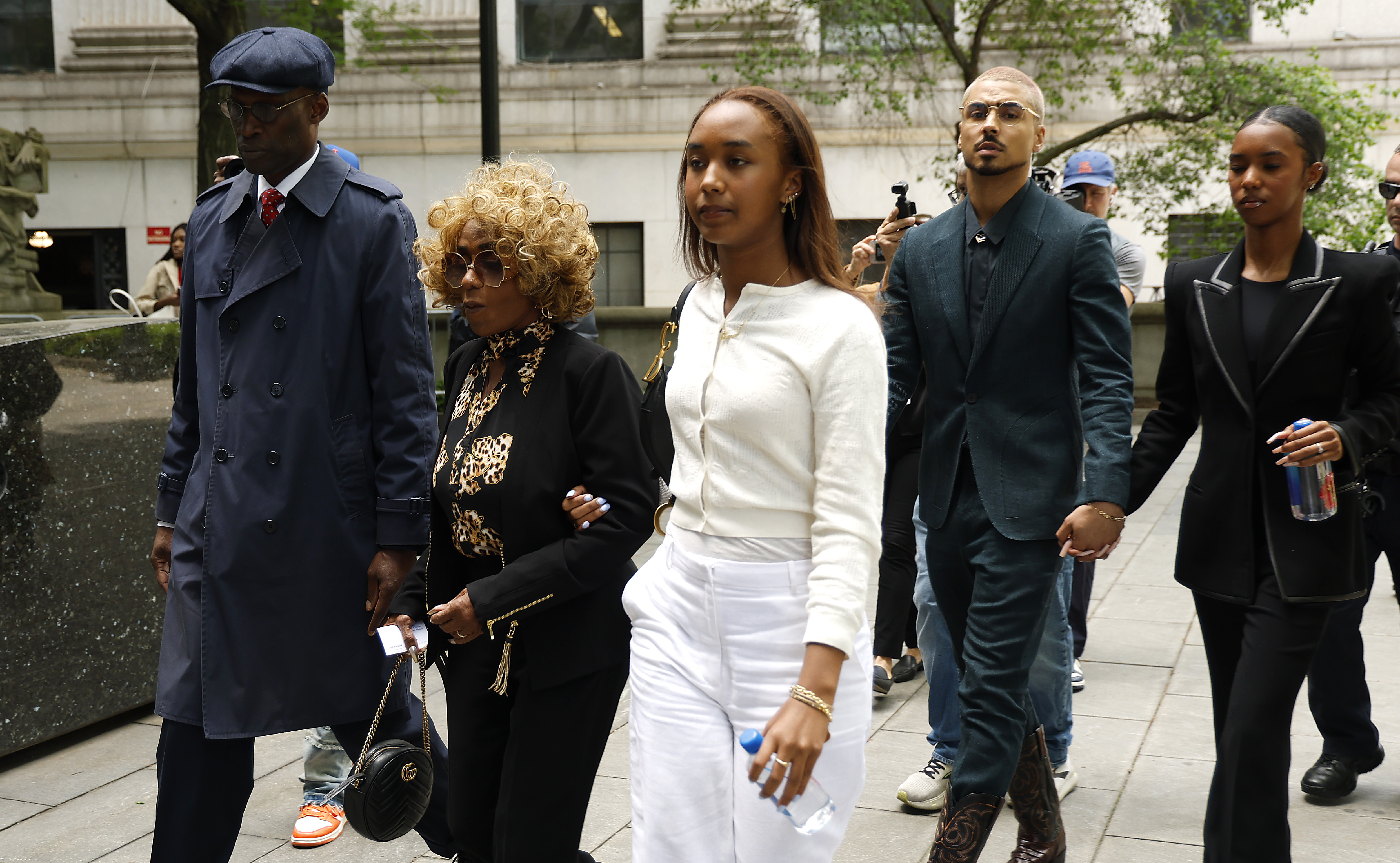 Janice Combs departs the courthouse with family on May 12, 2025, after opening statements in Sean "Diddy" Combs' federal trial in New York City | Source: Getty Images