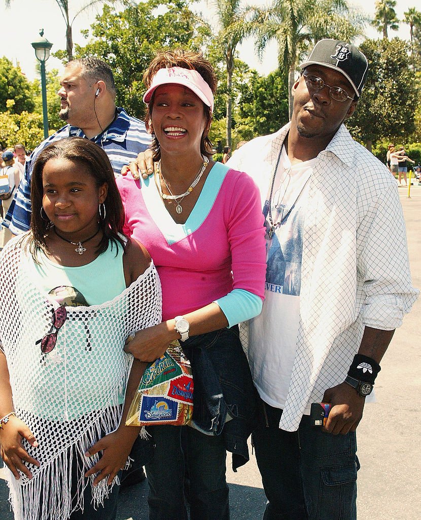 Whitney Houston and Bobby Brown and family at Disneyland on August 7, 2004 in Anaheim, California | Photo: Getty Images