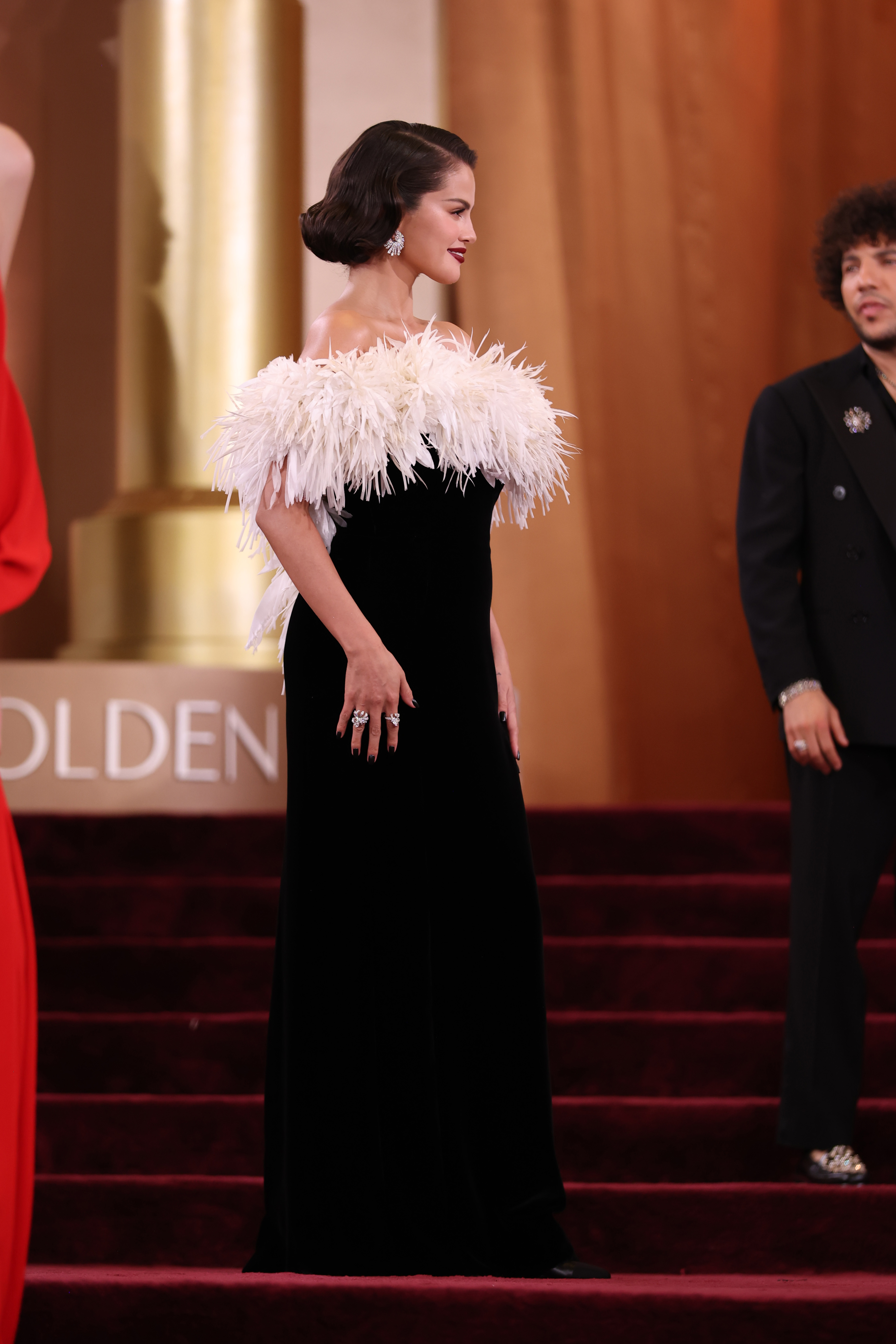 Selena Gomez and Benny Blanco (off to the side) at the 83rd annual Golden Globe Awards in Beverly Hills, California on January 11, 2026. | Source: Getty Images
