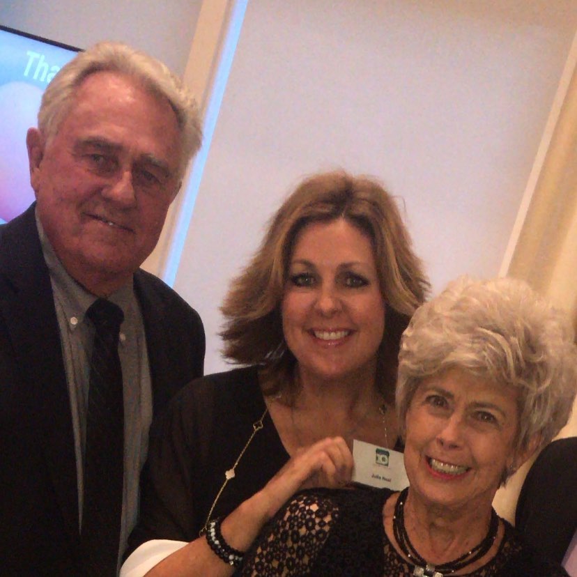 Julie Neal with her parents from a post dated June 20, 2021. | Source: Instagram/julieneal05