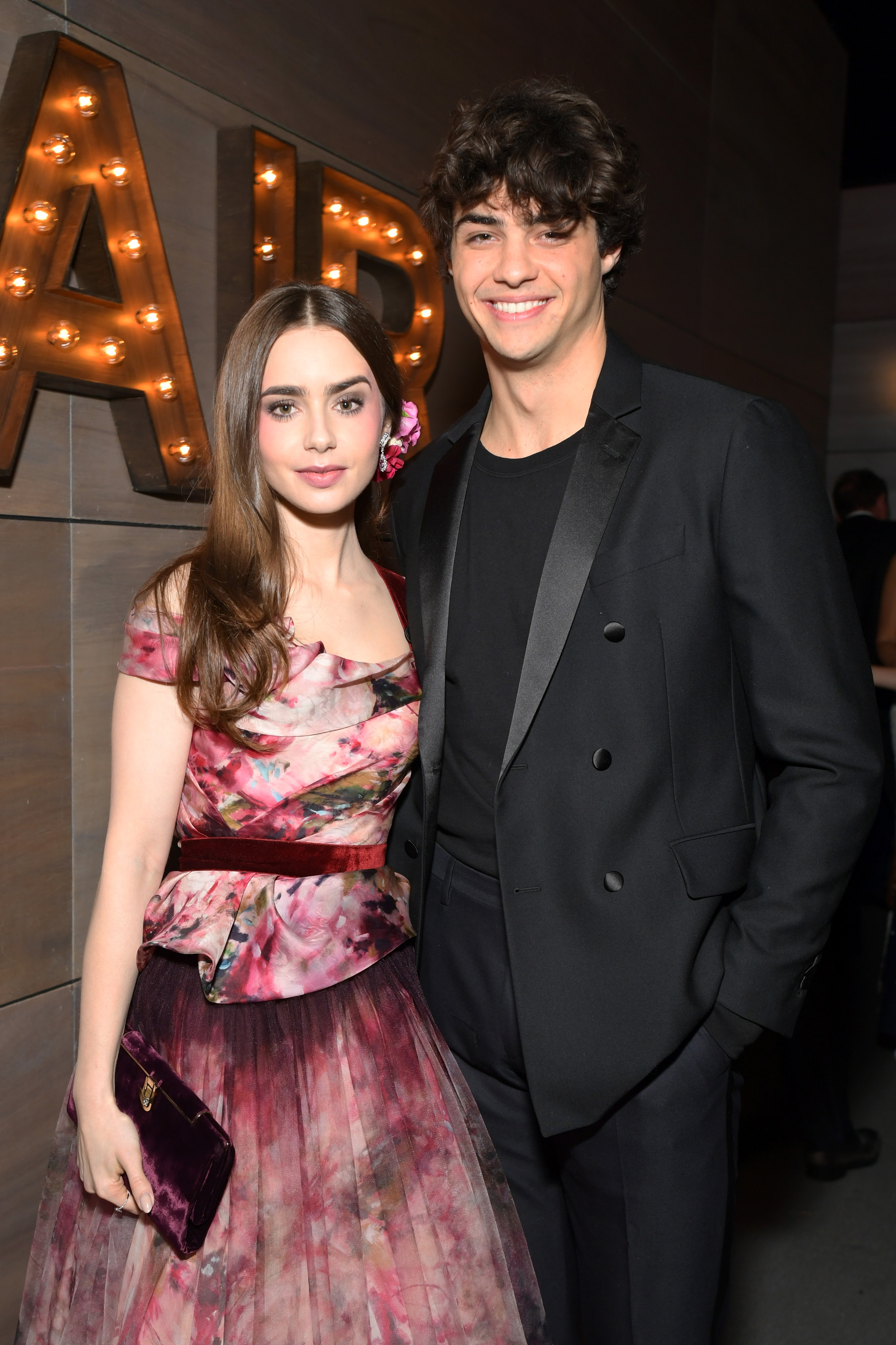 Lily Collins and Noah Centineo attend the 2019 Vanity Fair Oscar Party hosted by Radhika Jones at Wallis Annenberg Center for the Performing Arts on February 24, 2019, in Beverly Hills, California. | Source: Getty Images