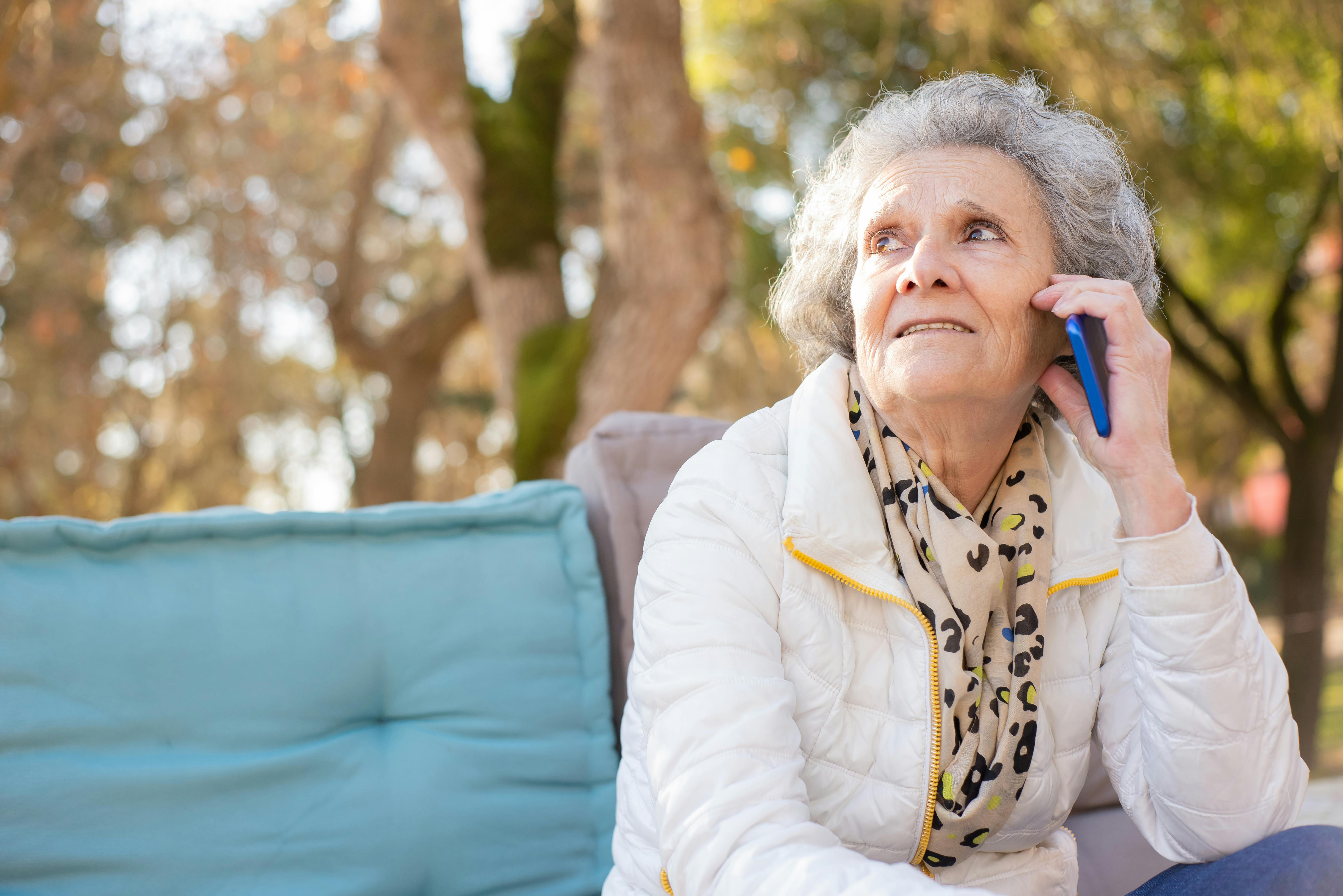 An elderly woman talking on a mobile phone | Source: Pexels